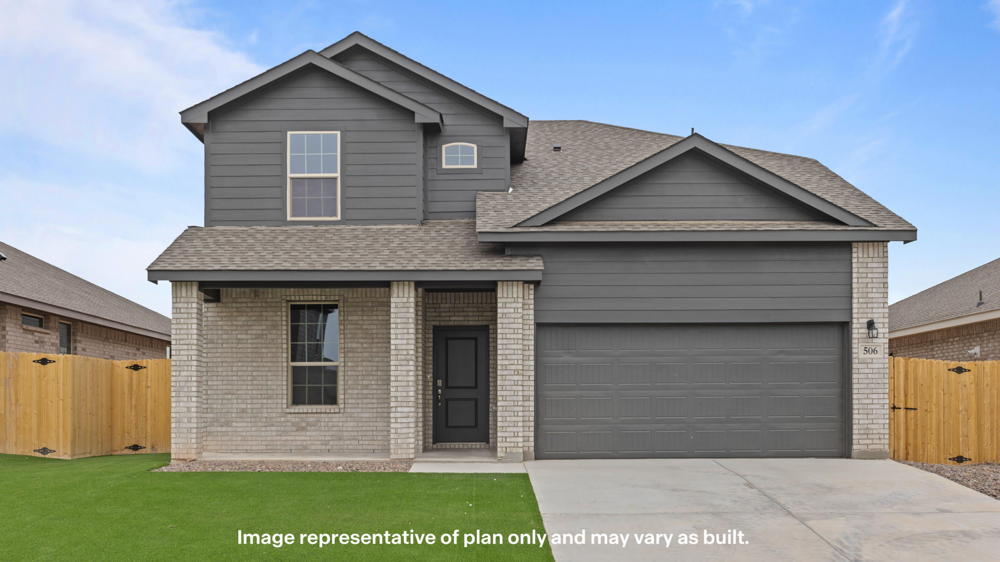 Exterior of two story modern brick home