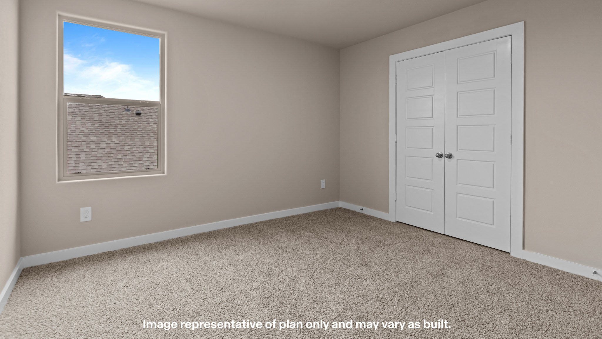 Upstairs guest bedroom 2 with plush carpeted floors and ample natural light