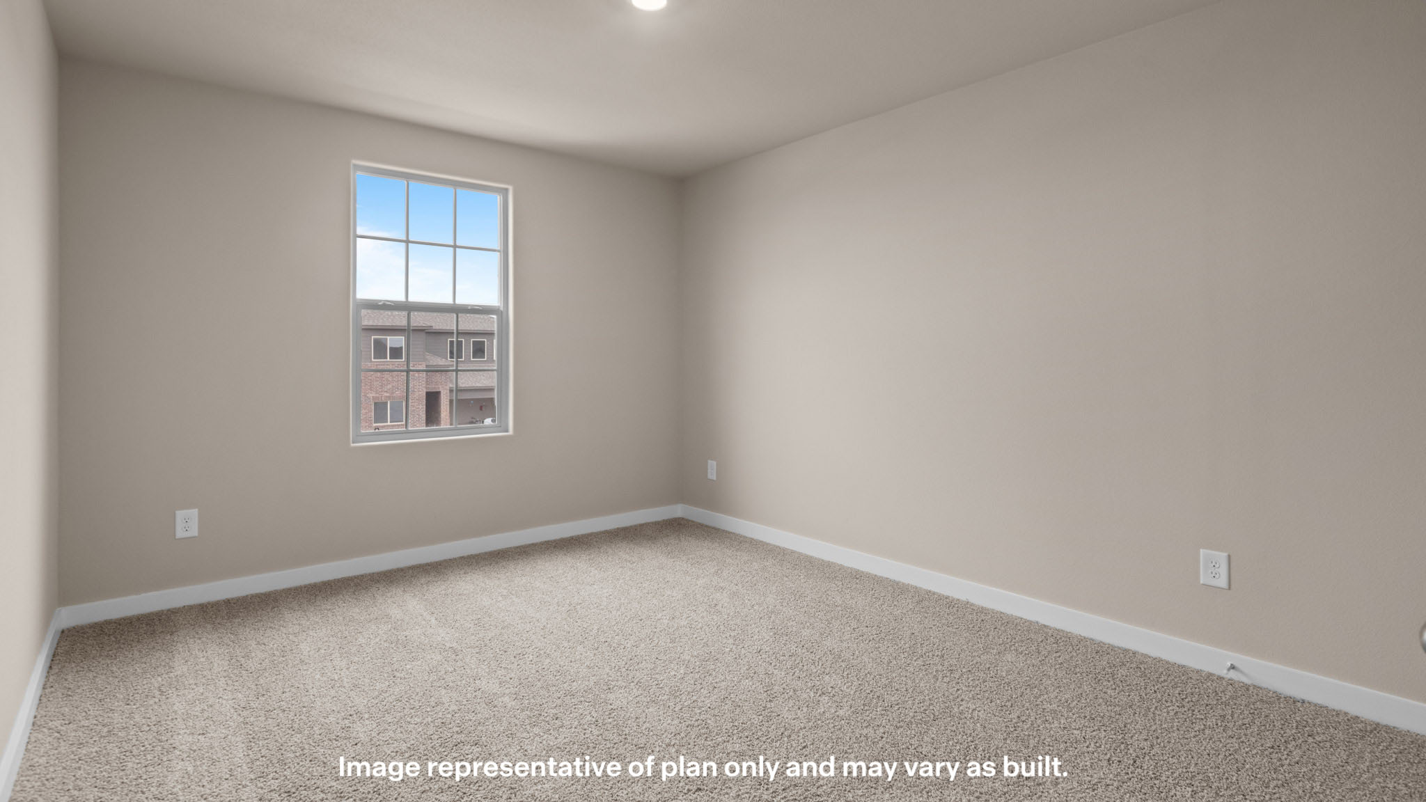 Upstairs guest bedroom 4 with plush carpet floors and front window