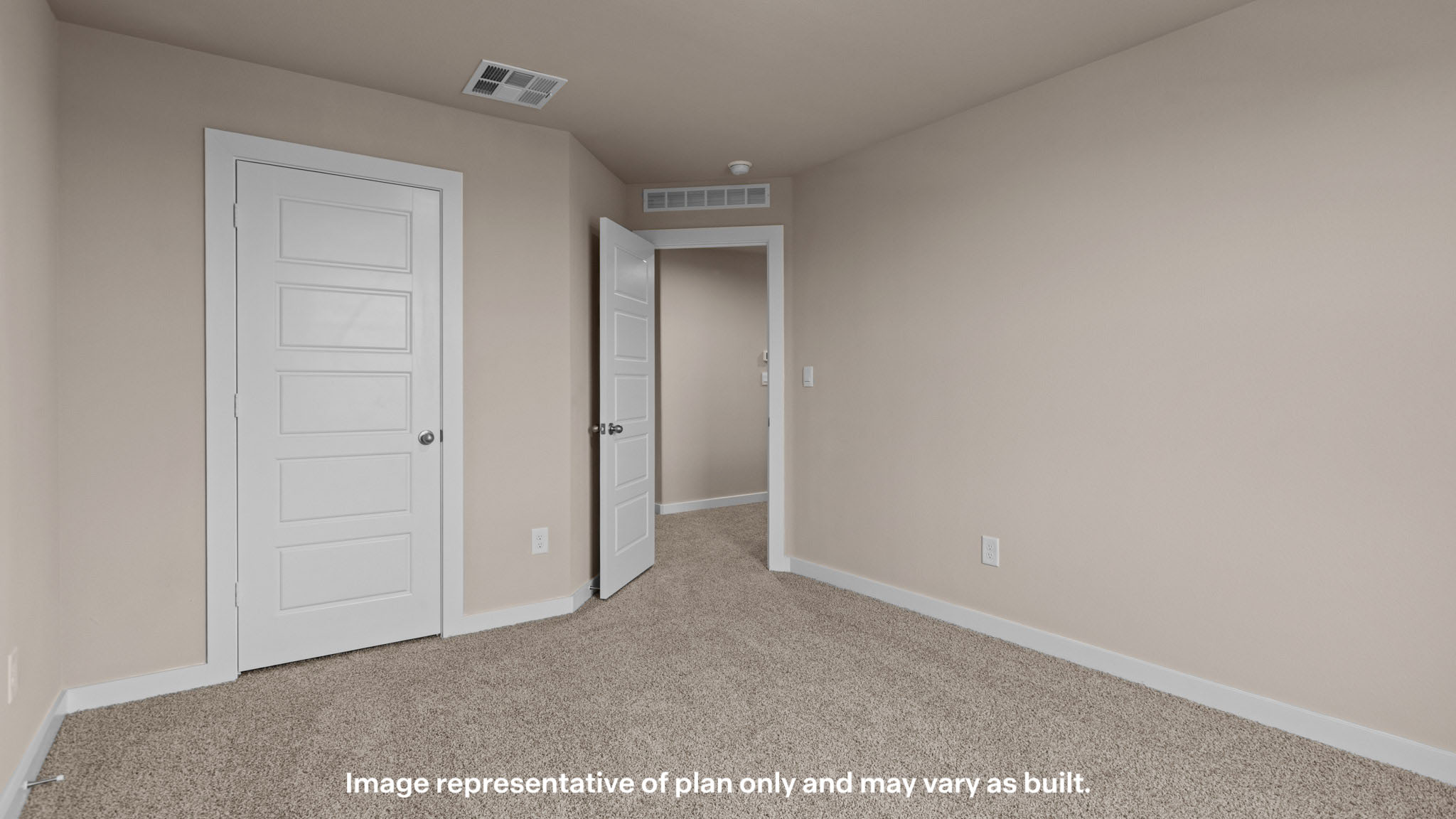 Upstairs guest bedroom 4 with plush carpet floors and front window