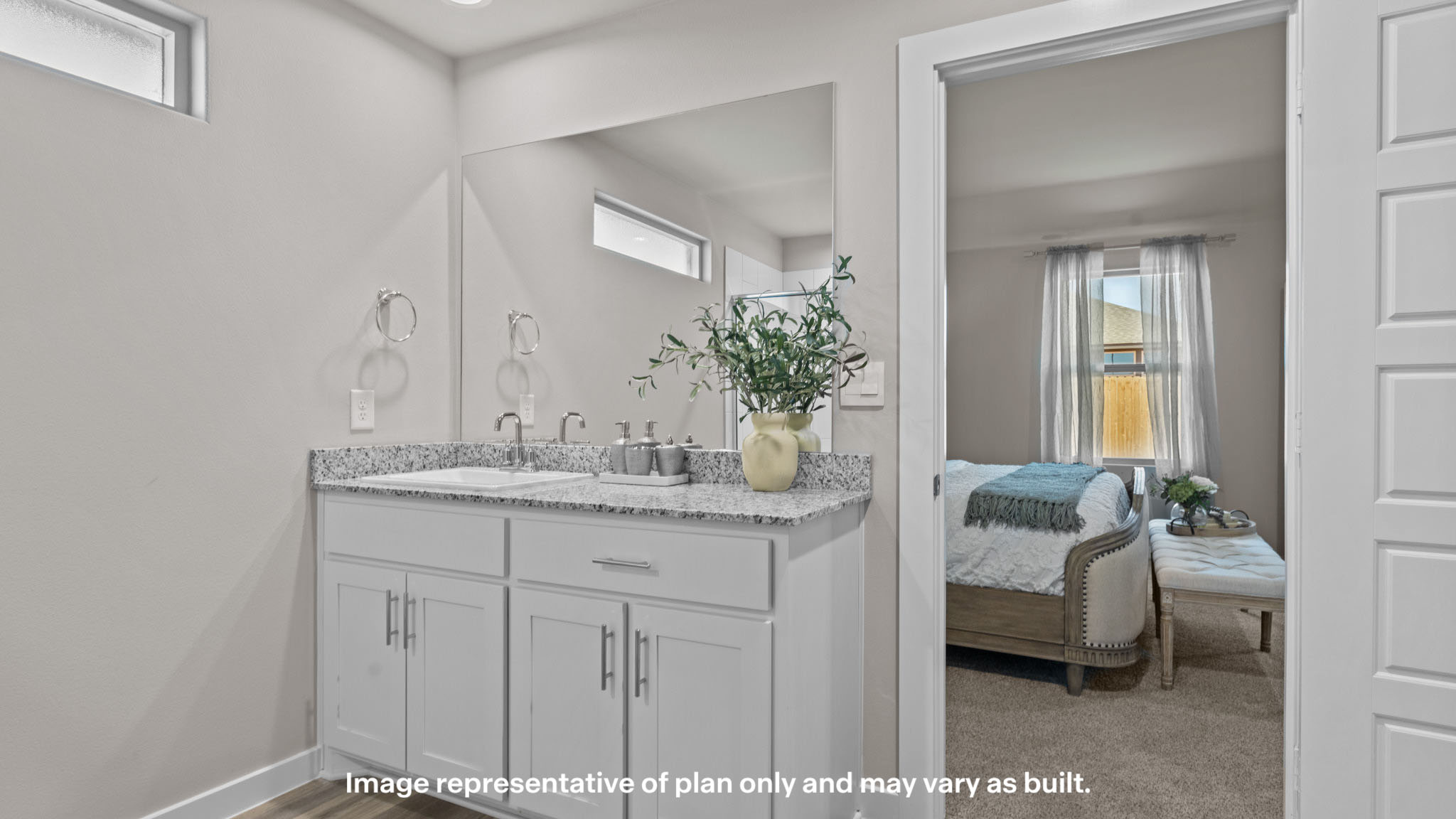 Primary bathroom with built in vanity and luxurious shower
