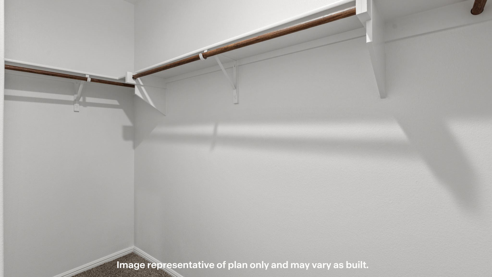 Primary walk-in closet with extra storage space