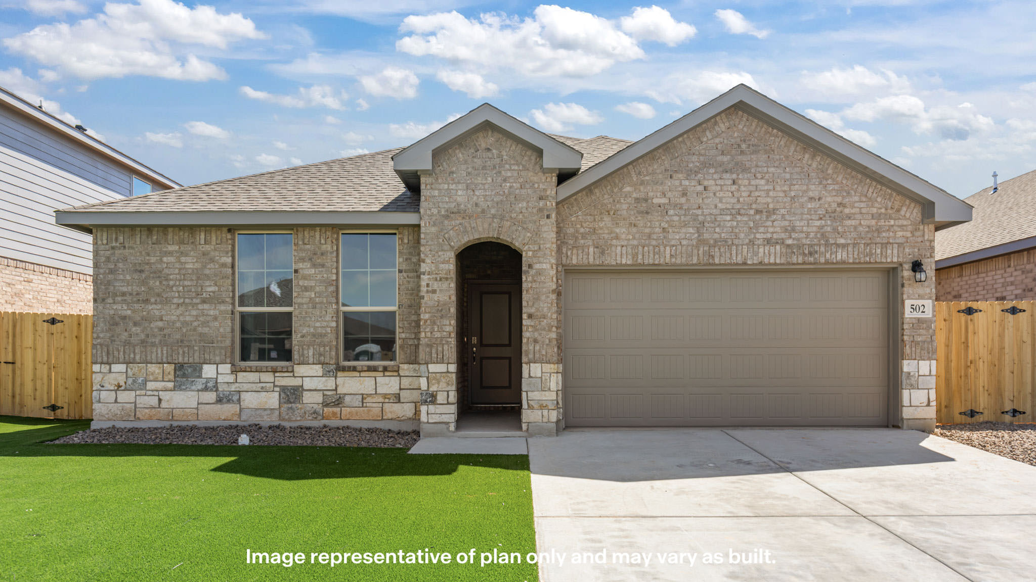 Exterior of single story modern brick style home