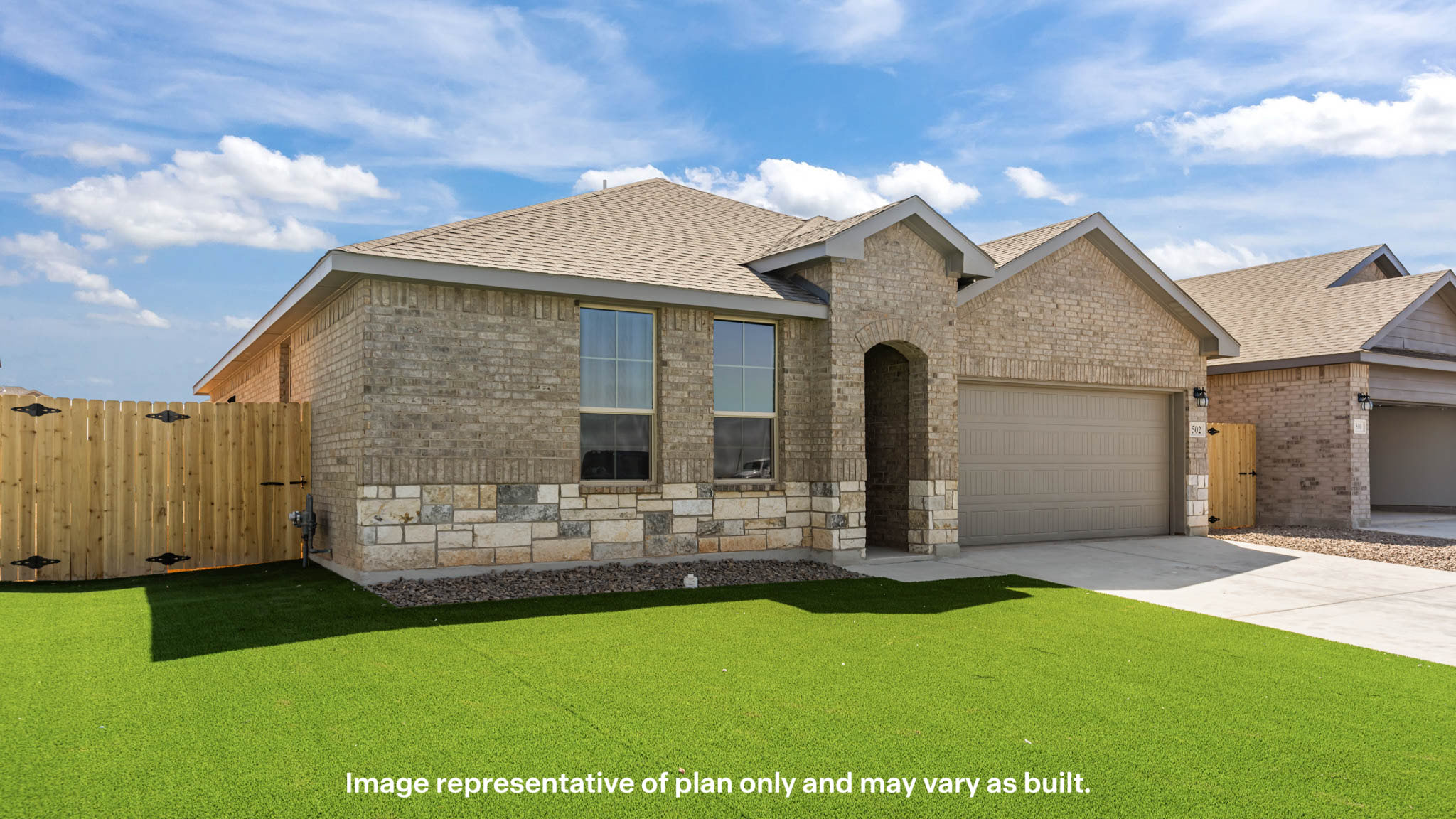 Side view of single story timeless brick home