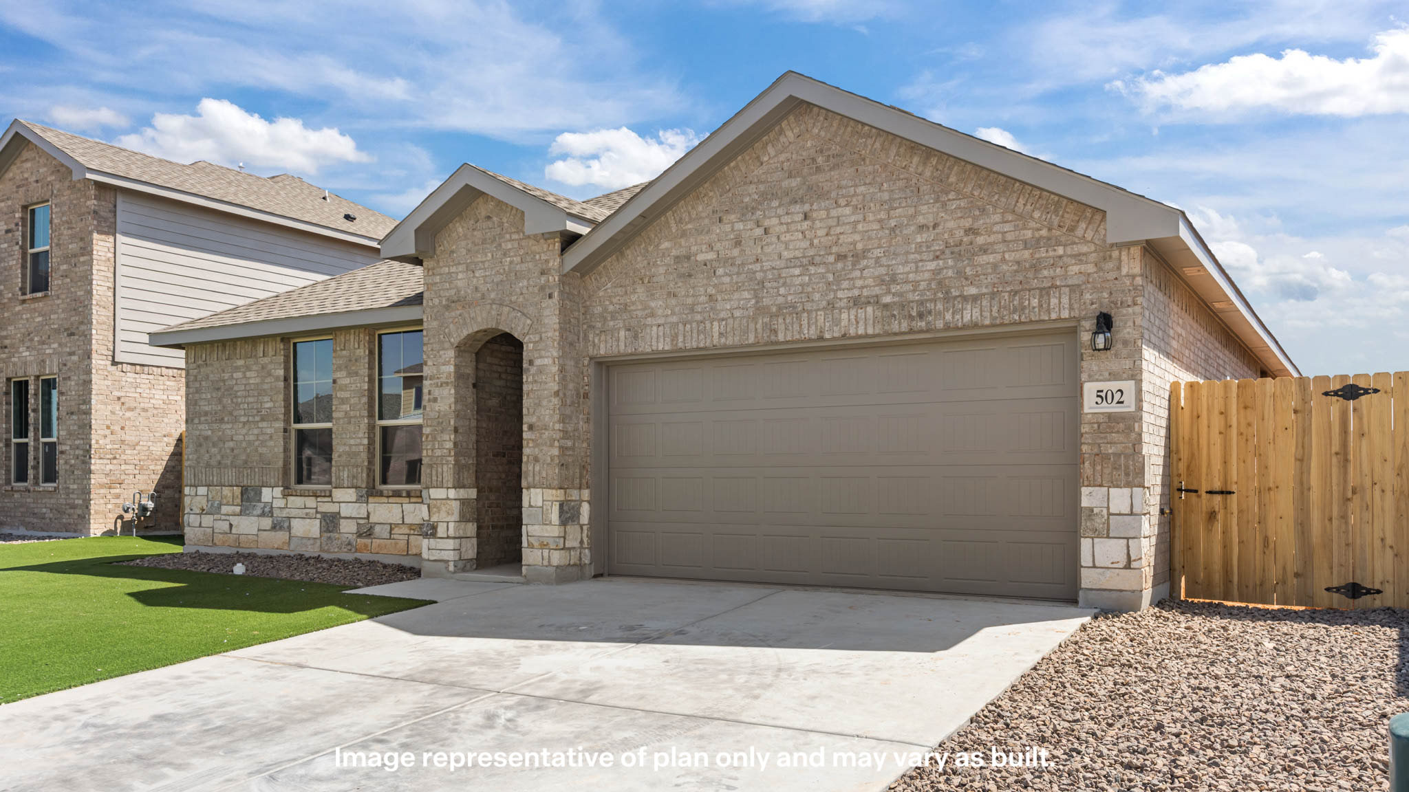 Side view of single story timeless brick home