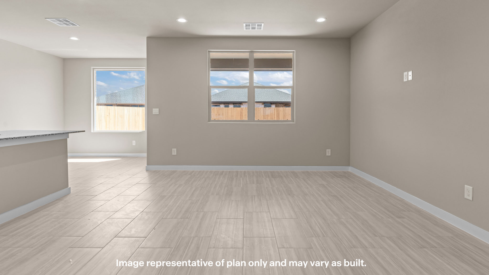 Open living and family room area with ample natural light