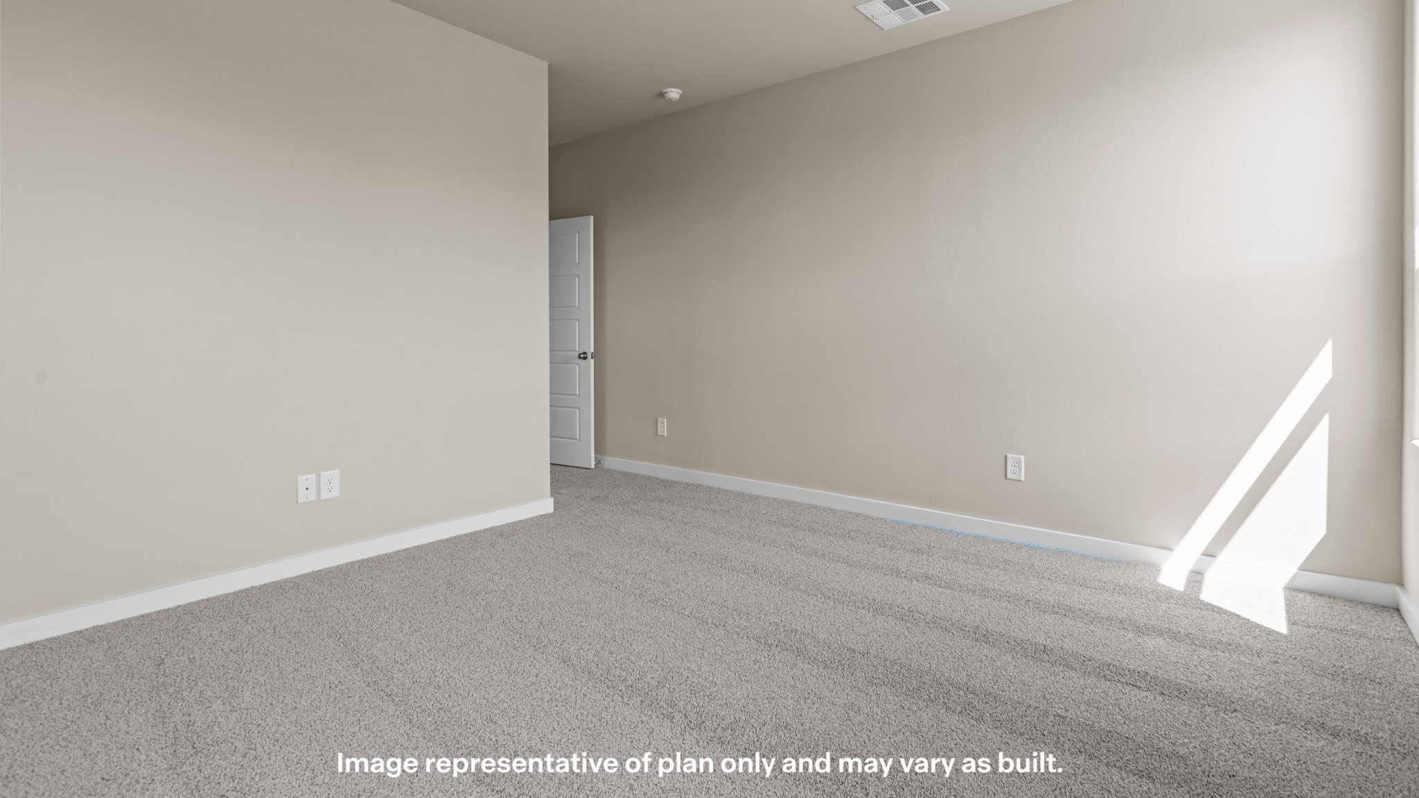 Primary bedroom with private attached bathroom and walk-in closet