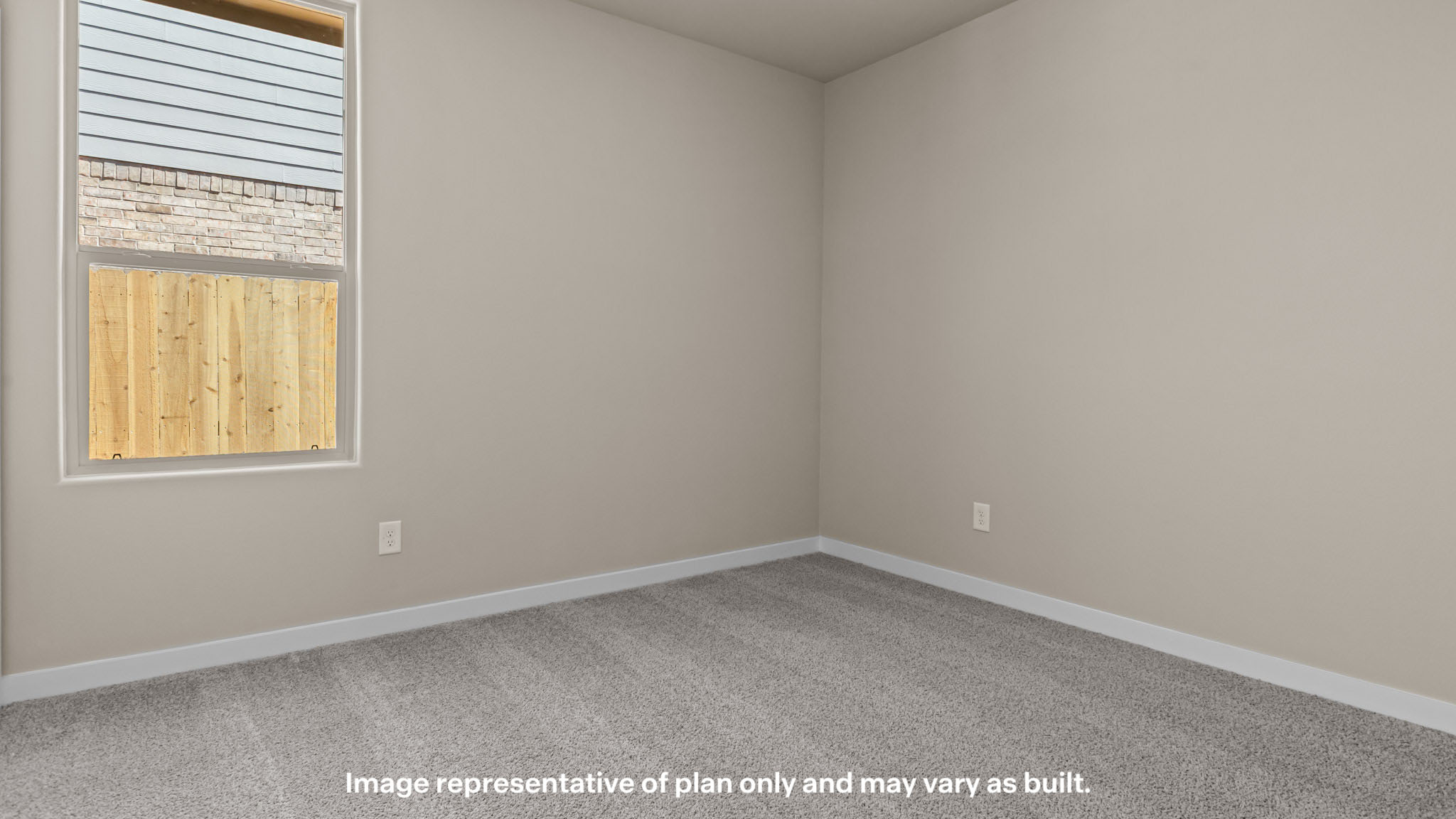 Guest bedroom 2 with side window and plush carpet floor