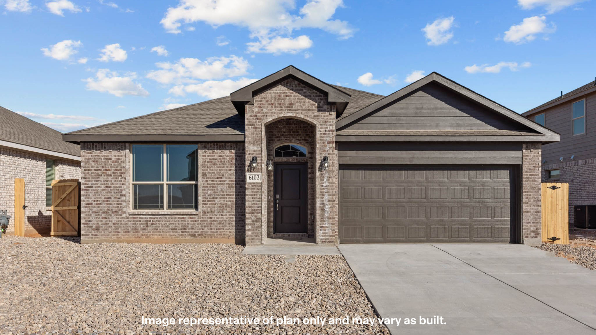 Exterior of single story modern brick style home