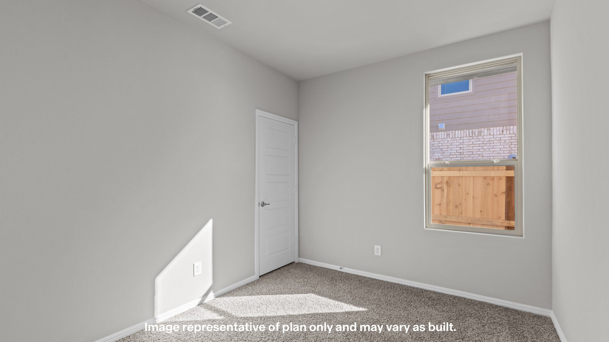 Guest bedroom 3 with plush carpet floors and spacious closet