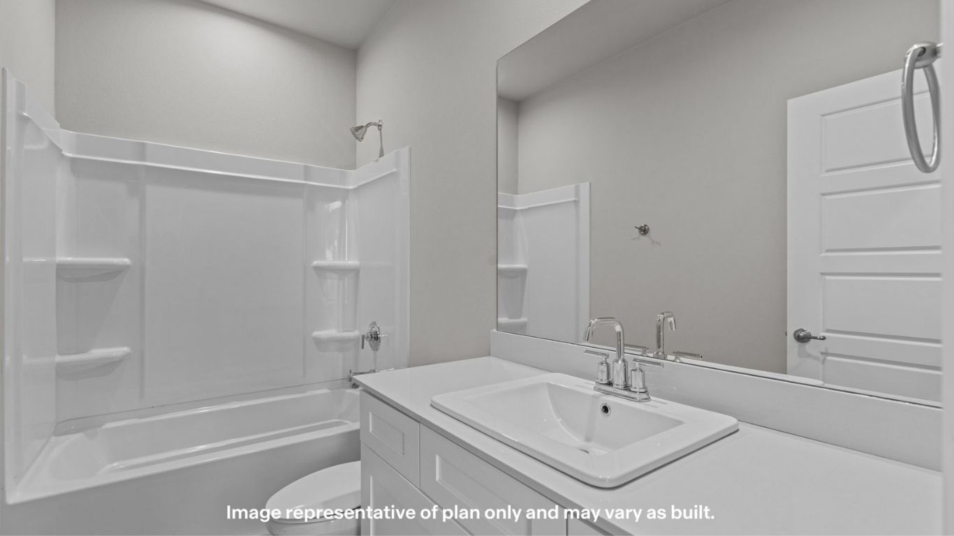 Secondary bathroom with modern vanity and tub/shower combo.