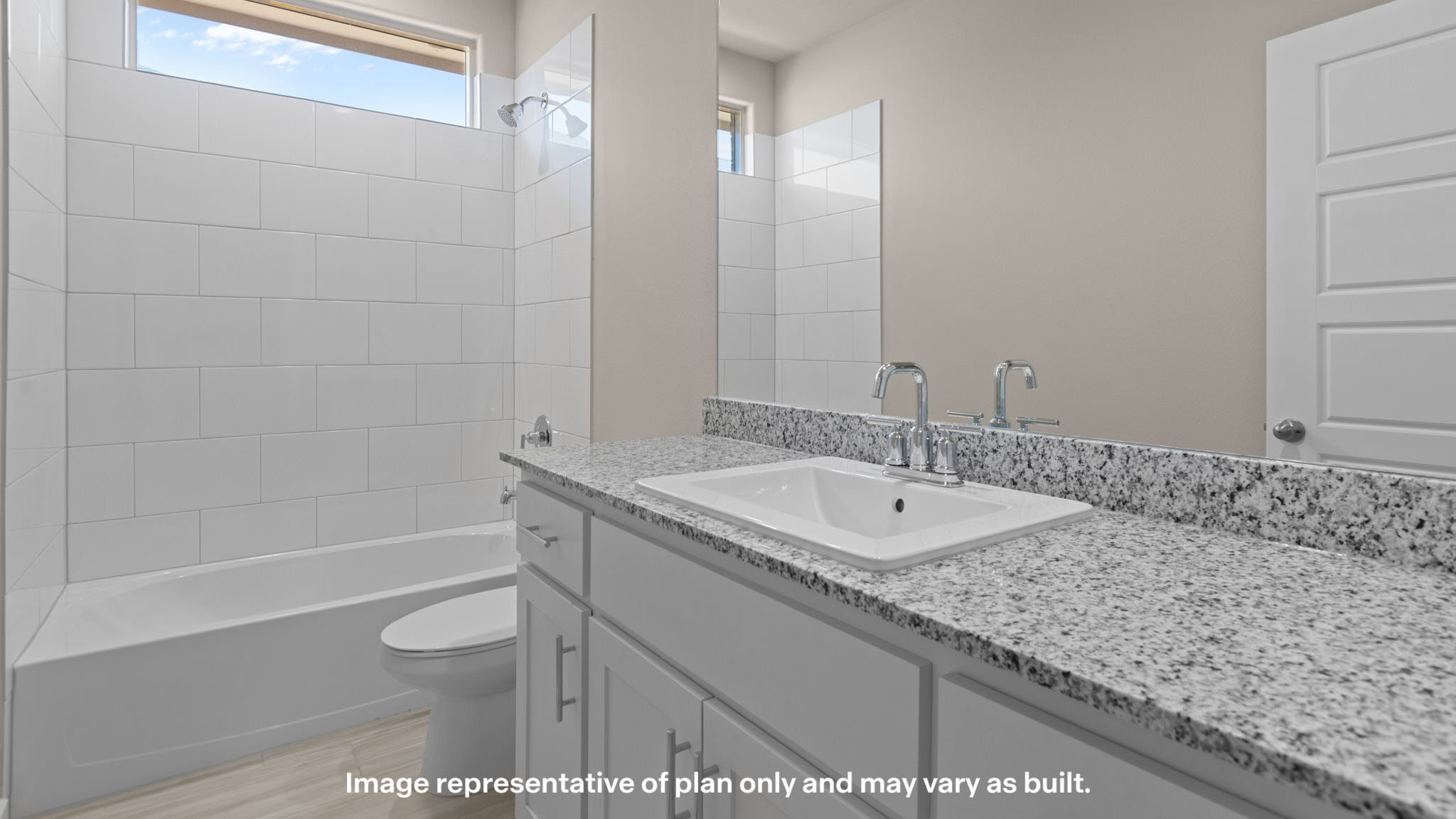Full secondary bathroom with granite countertops, modern fixtures, and a tub/shower combination.