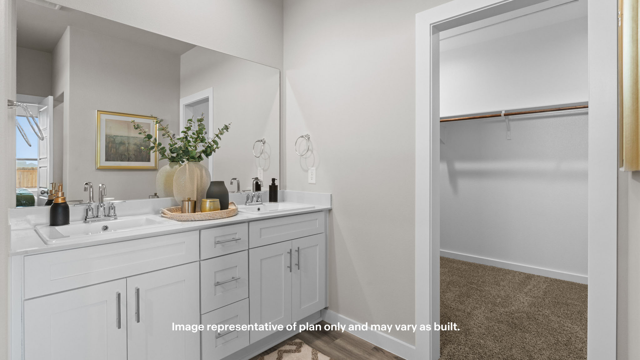 Primary bathroom with built in vanity and luxurious shower