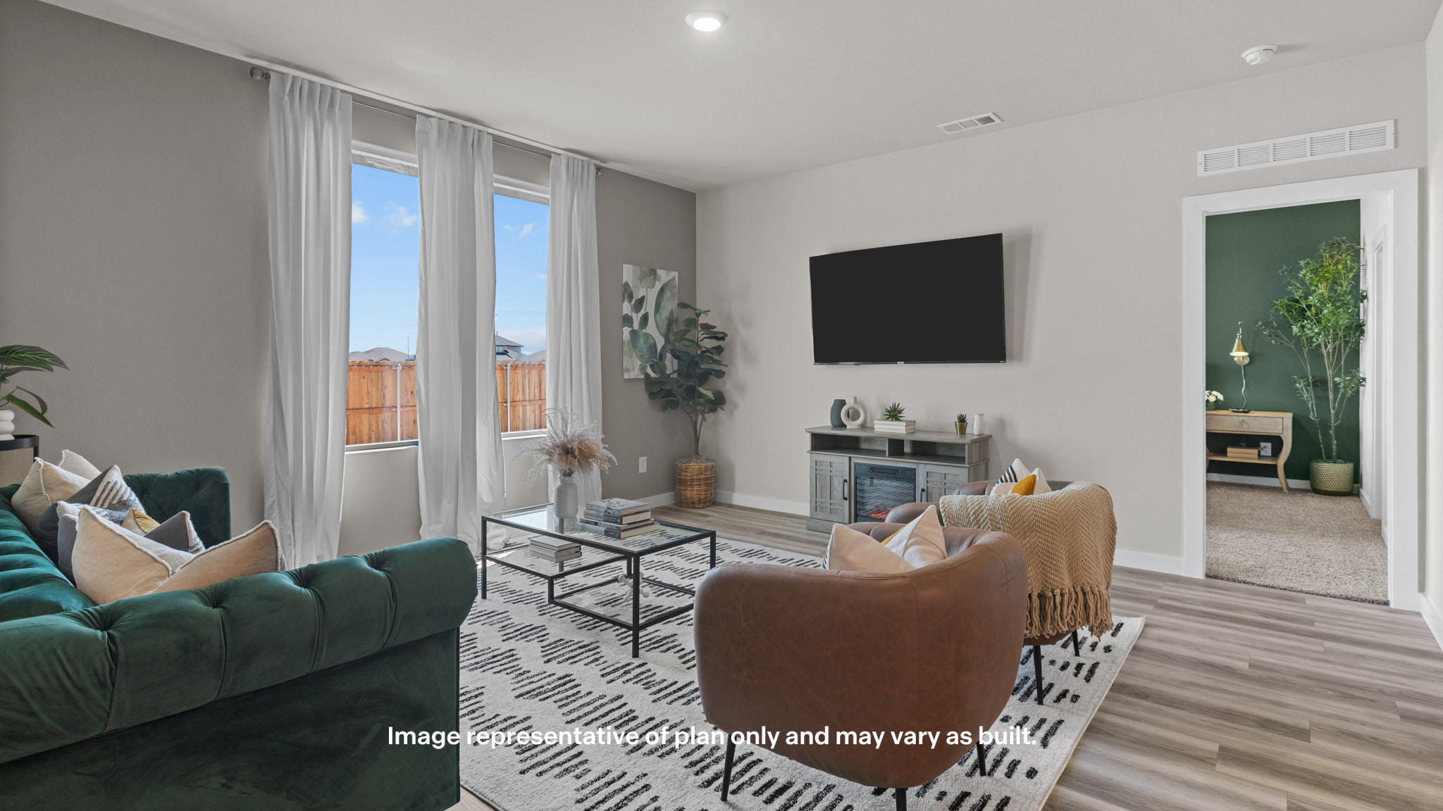 Open living and family room area with ample natural light