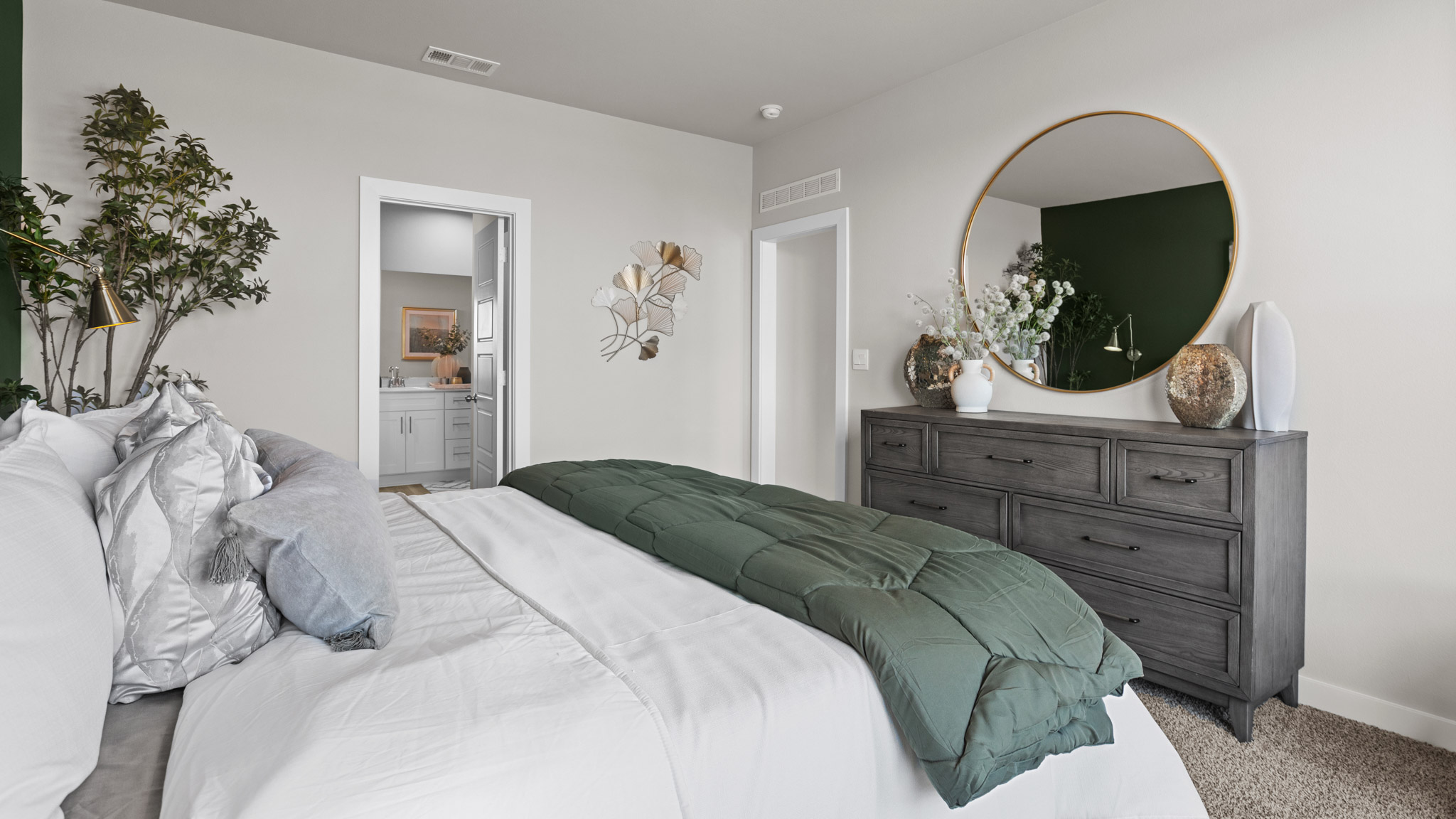 Primary bedroom with natural sunlight views
