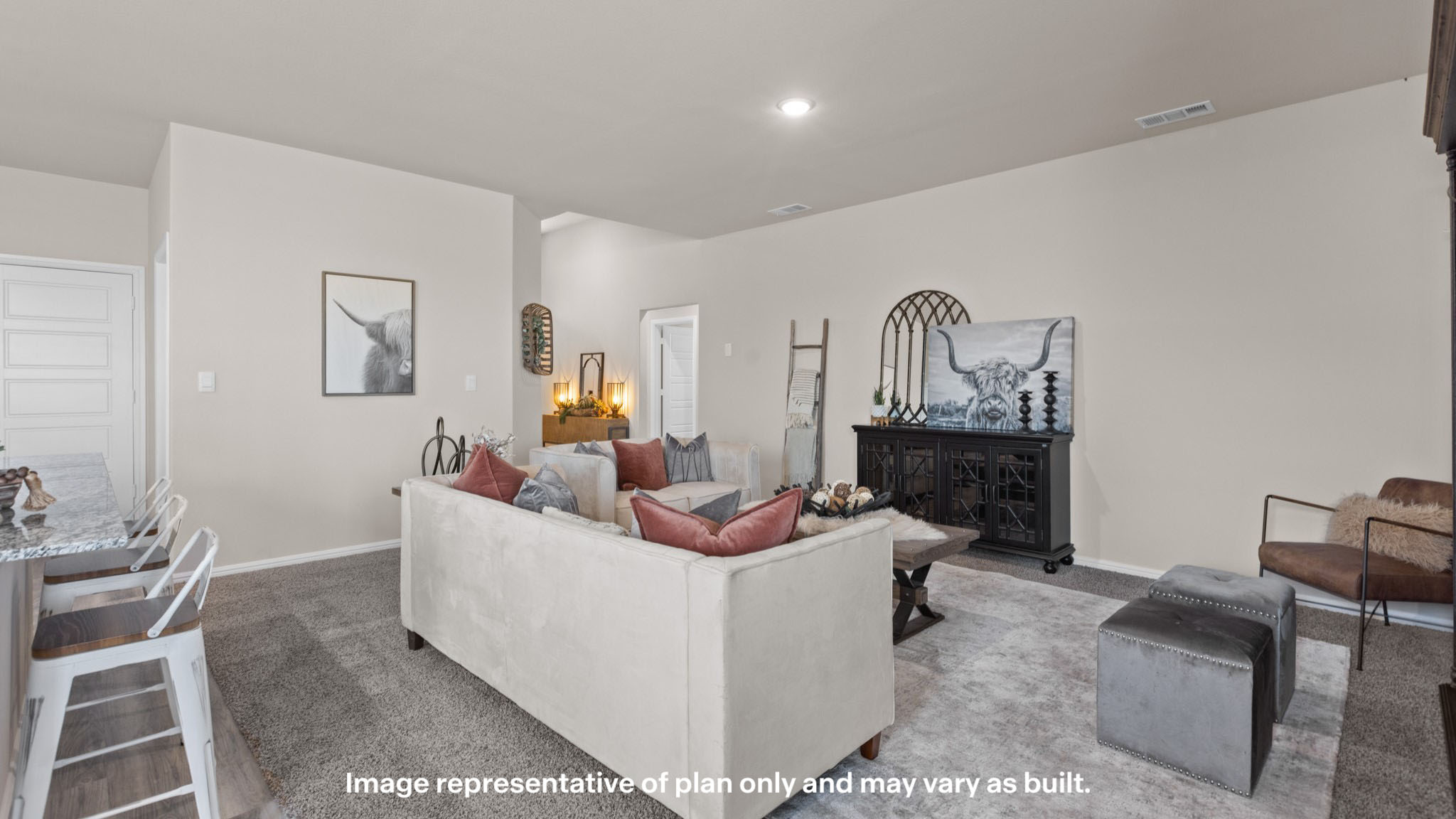 Spacious living and family room space with light allowing windows