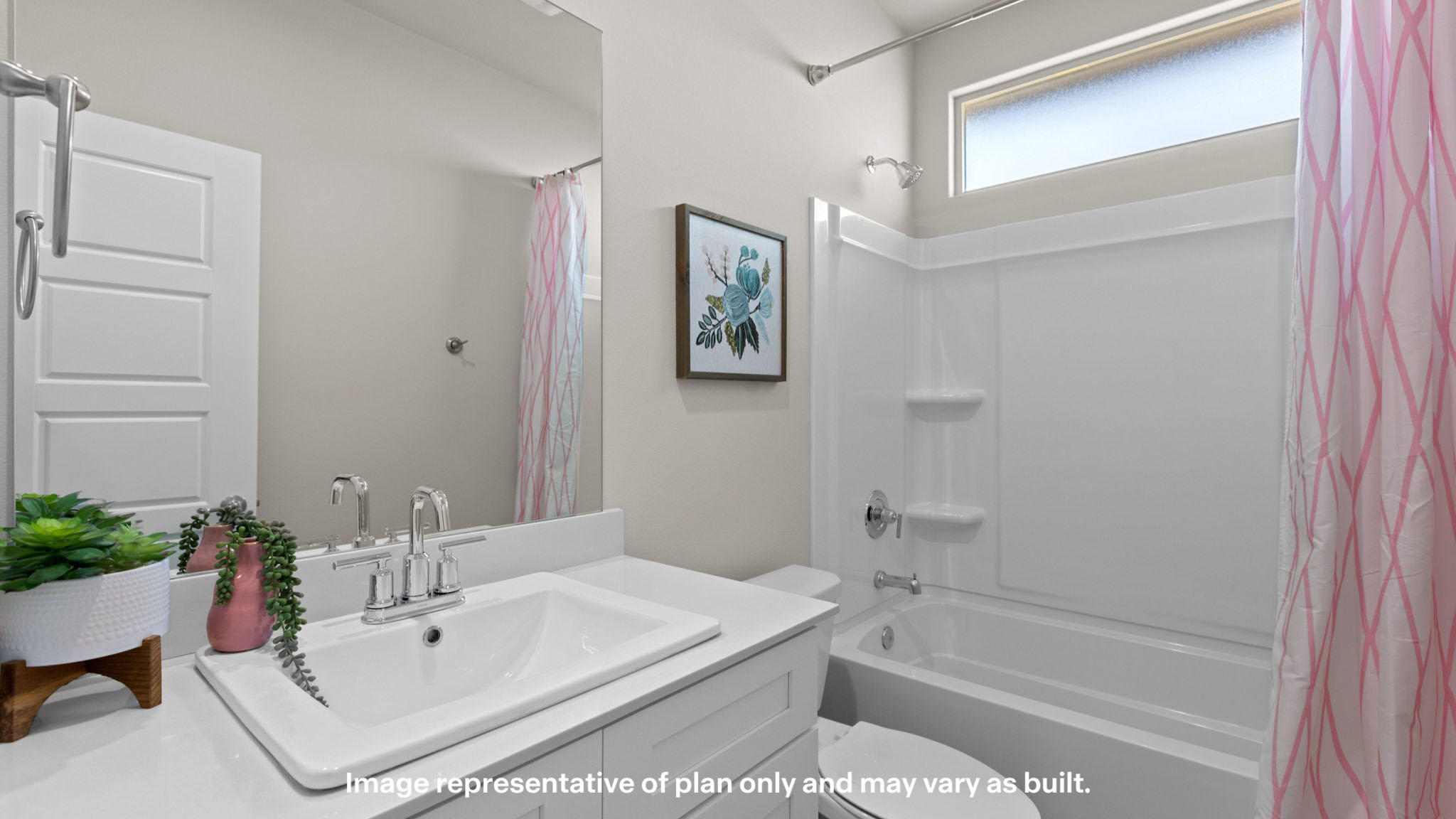 Guest bathroom with built in vanity and combination bathtub shower