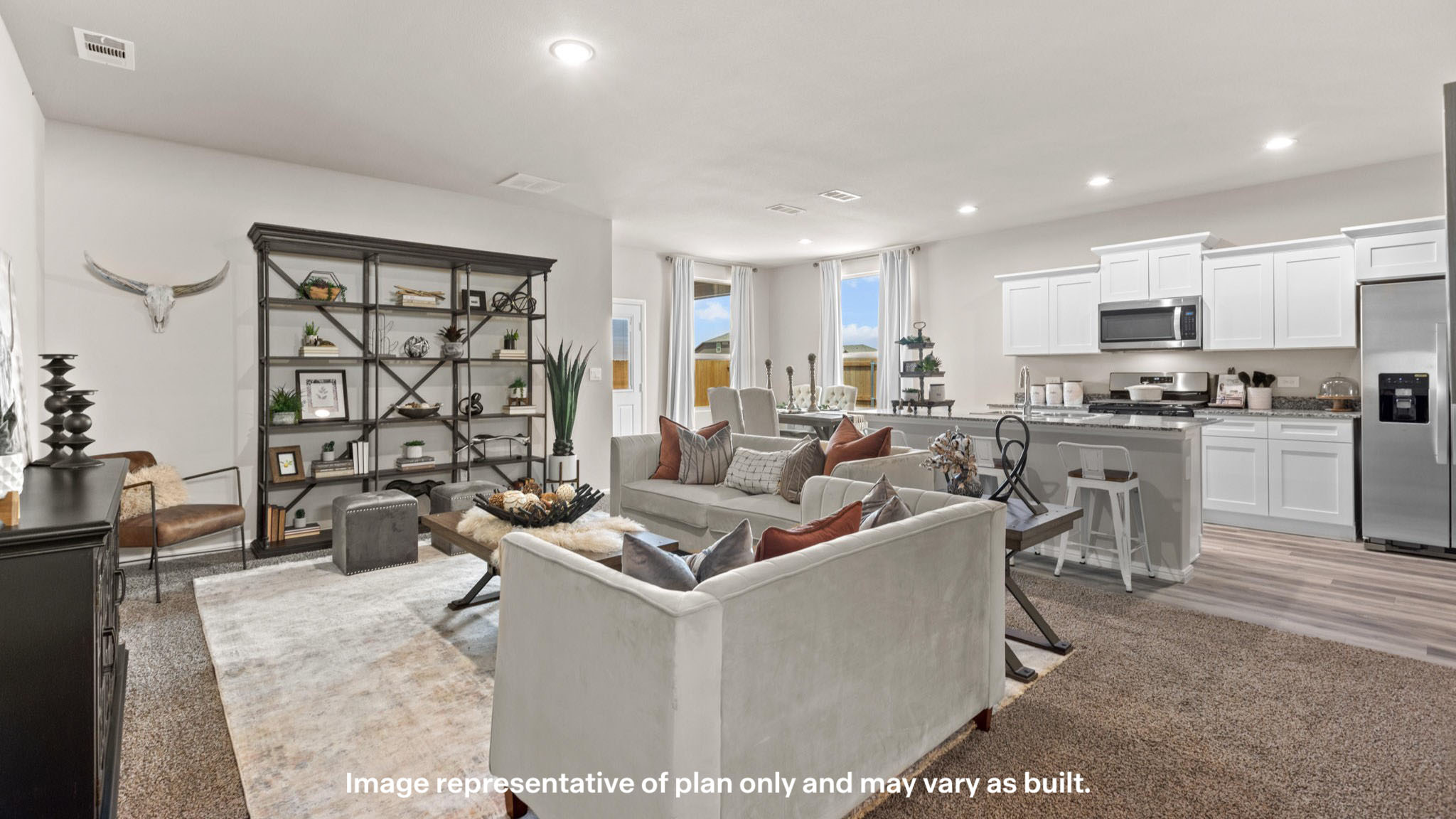 Open concept kitchen, living, family, and dining room space