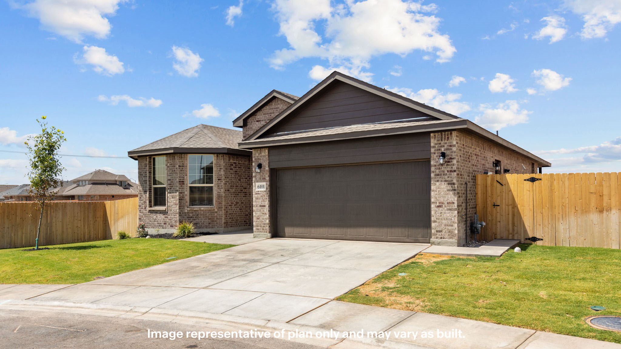 Single story classic brick home with front entry
