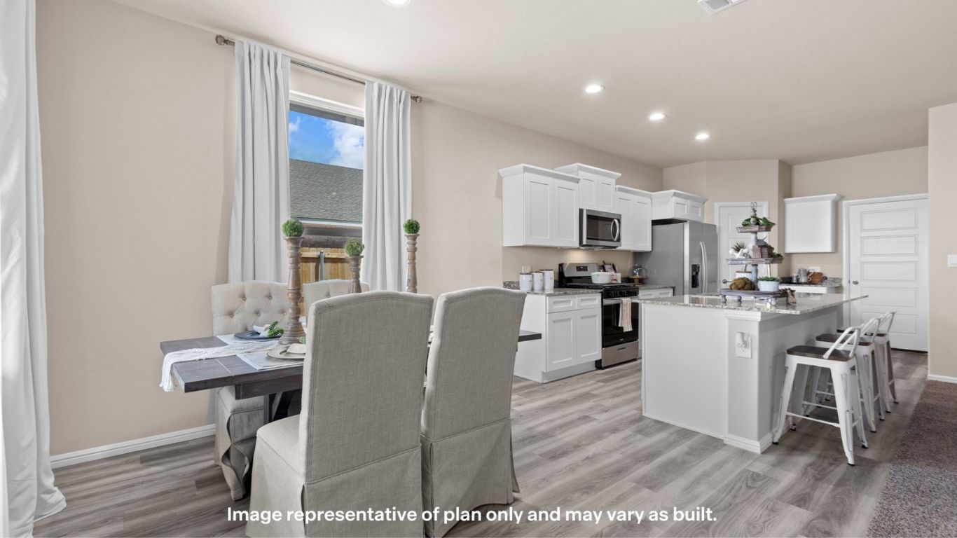Open dining room space adjacent to kitchen