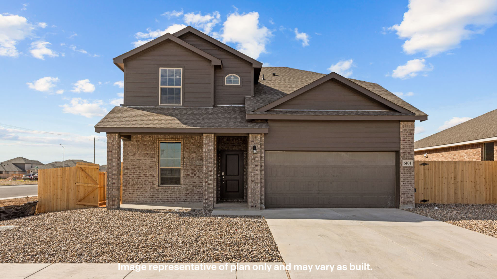 Exterior of two story modern brick home