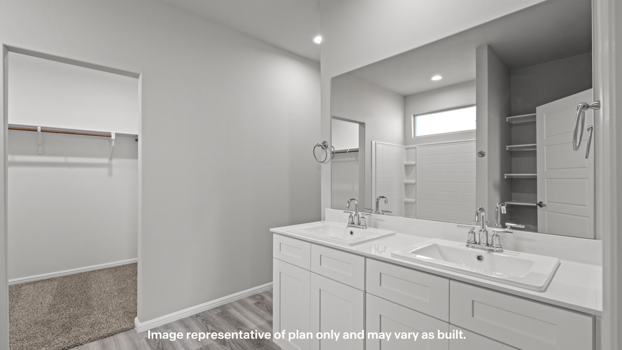 Private attached primary bathroom with built in vanity