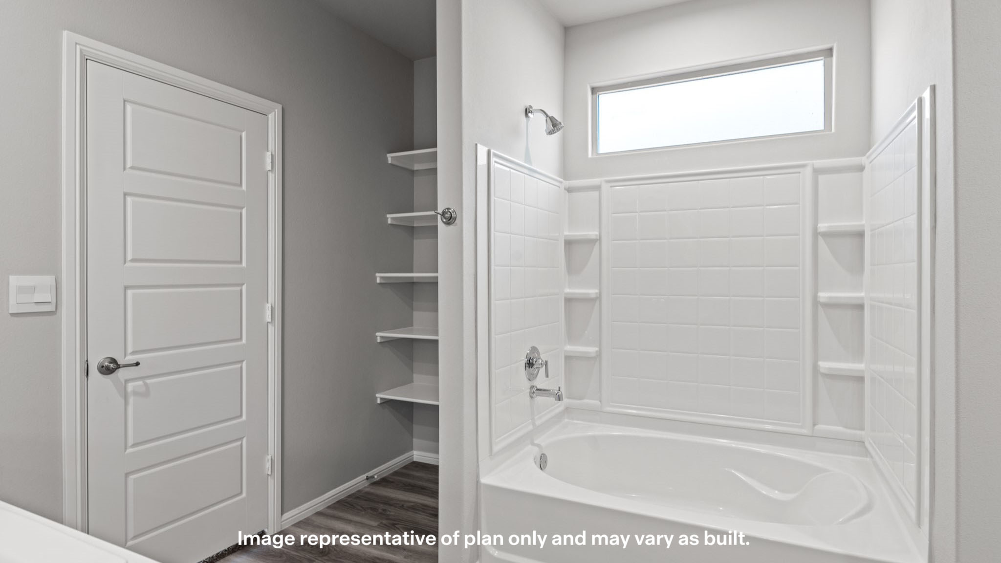 Primary bathroom with luxurious shower and built in storage