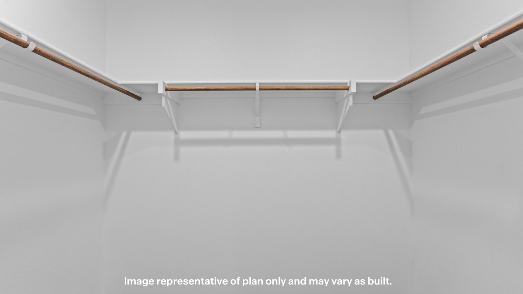 Private primary walk-in closet with extra storage space