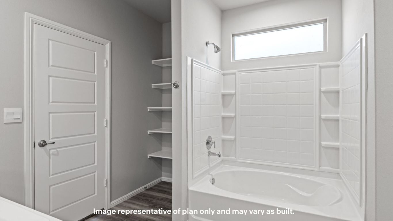Private attached primary bathroom with built in vanity