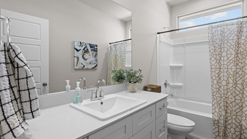 Guest bathroom perfectly situated between bedrooms three and four