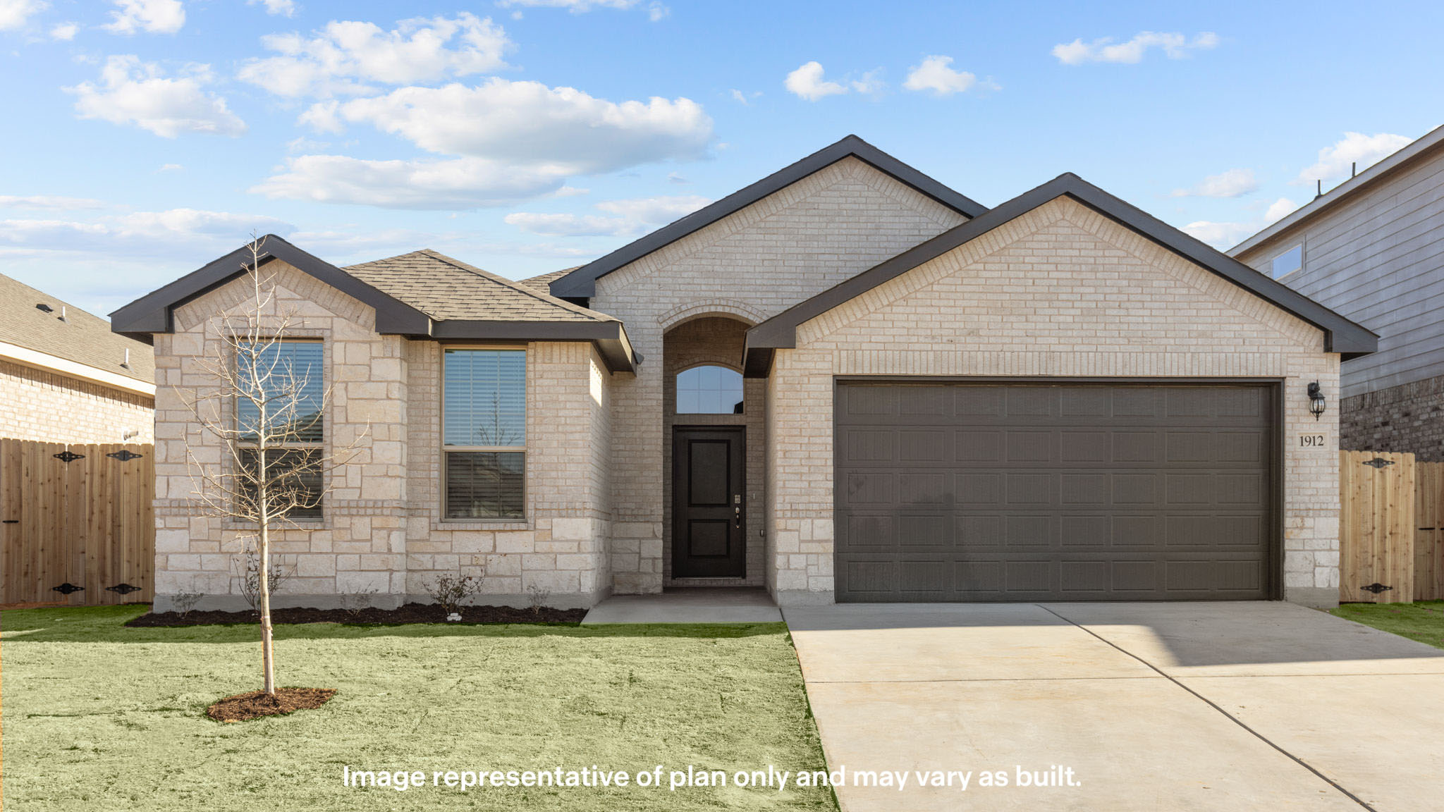 Exterior of single story modern brick style home