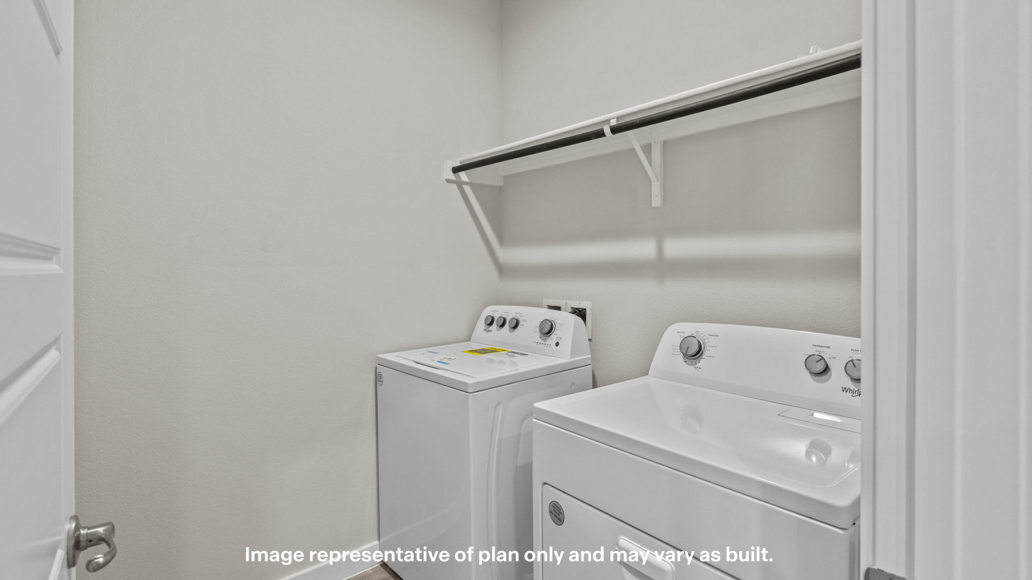 Laundry room and utility closet space with extra storage