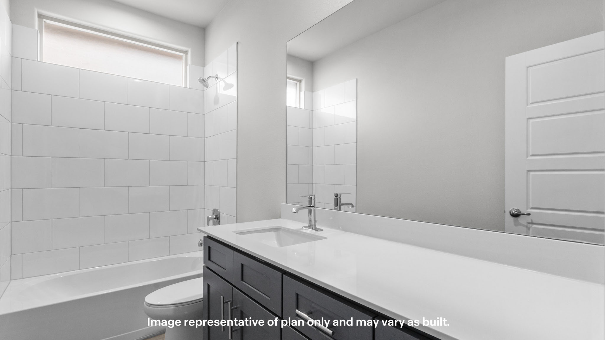 Guest bathroom with built in vanity and combination bathtub shower