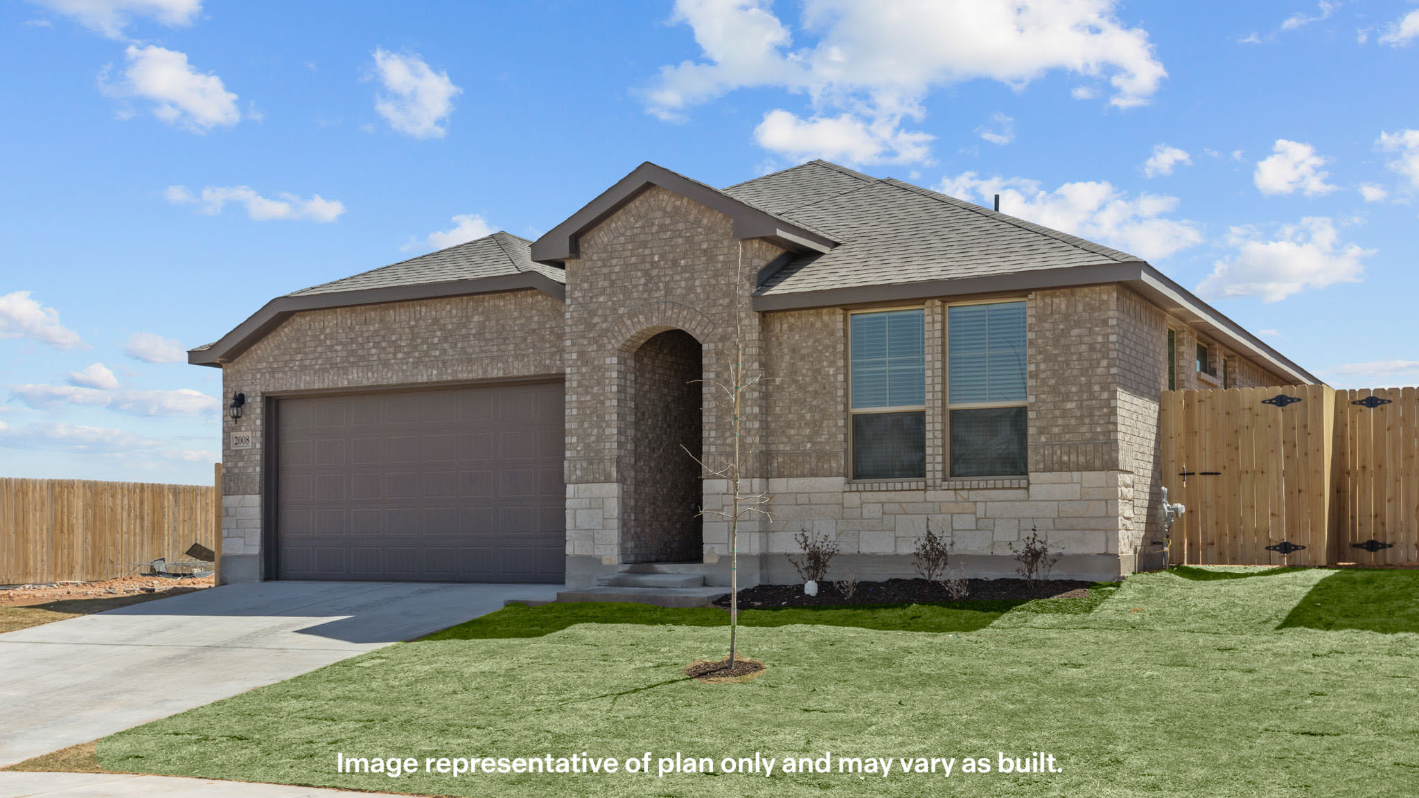 Single story classic brick home with front entry