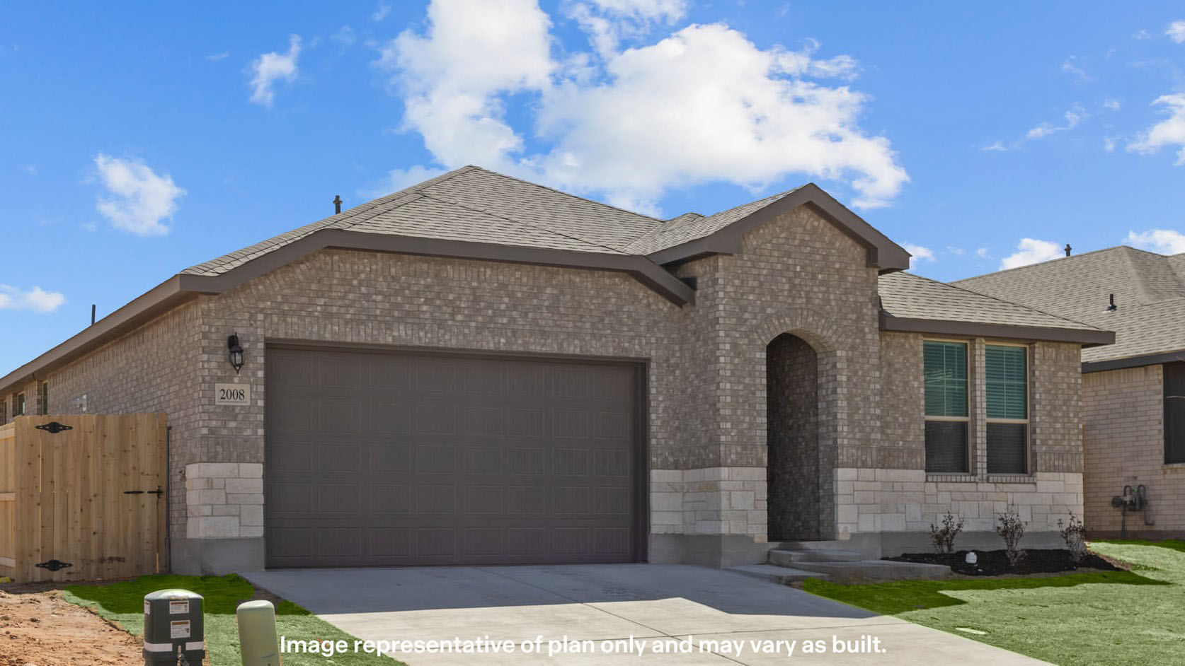 Side view of single story timeless brick home
