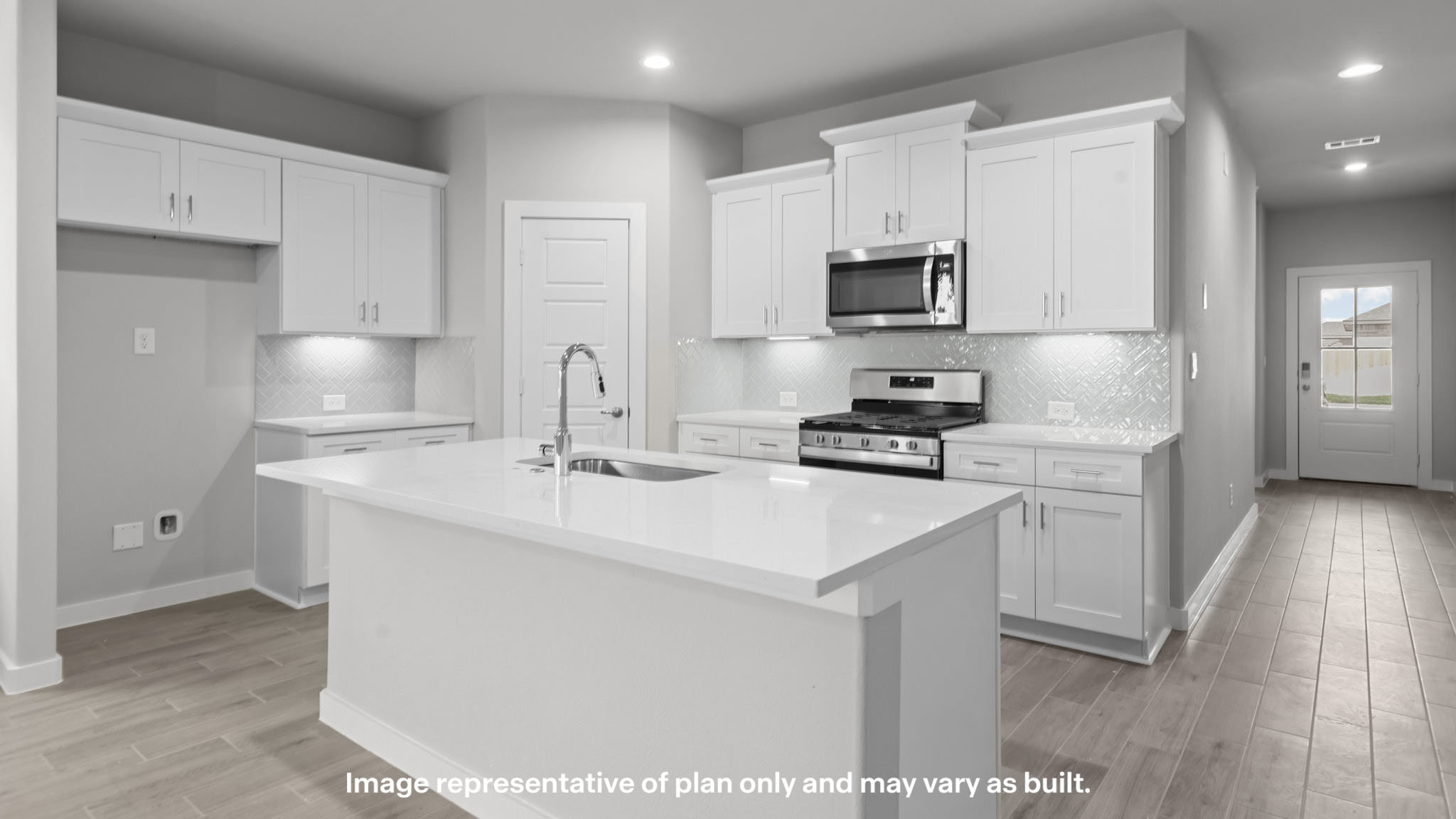 Spacious open concept kitchen with island and counter prep space