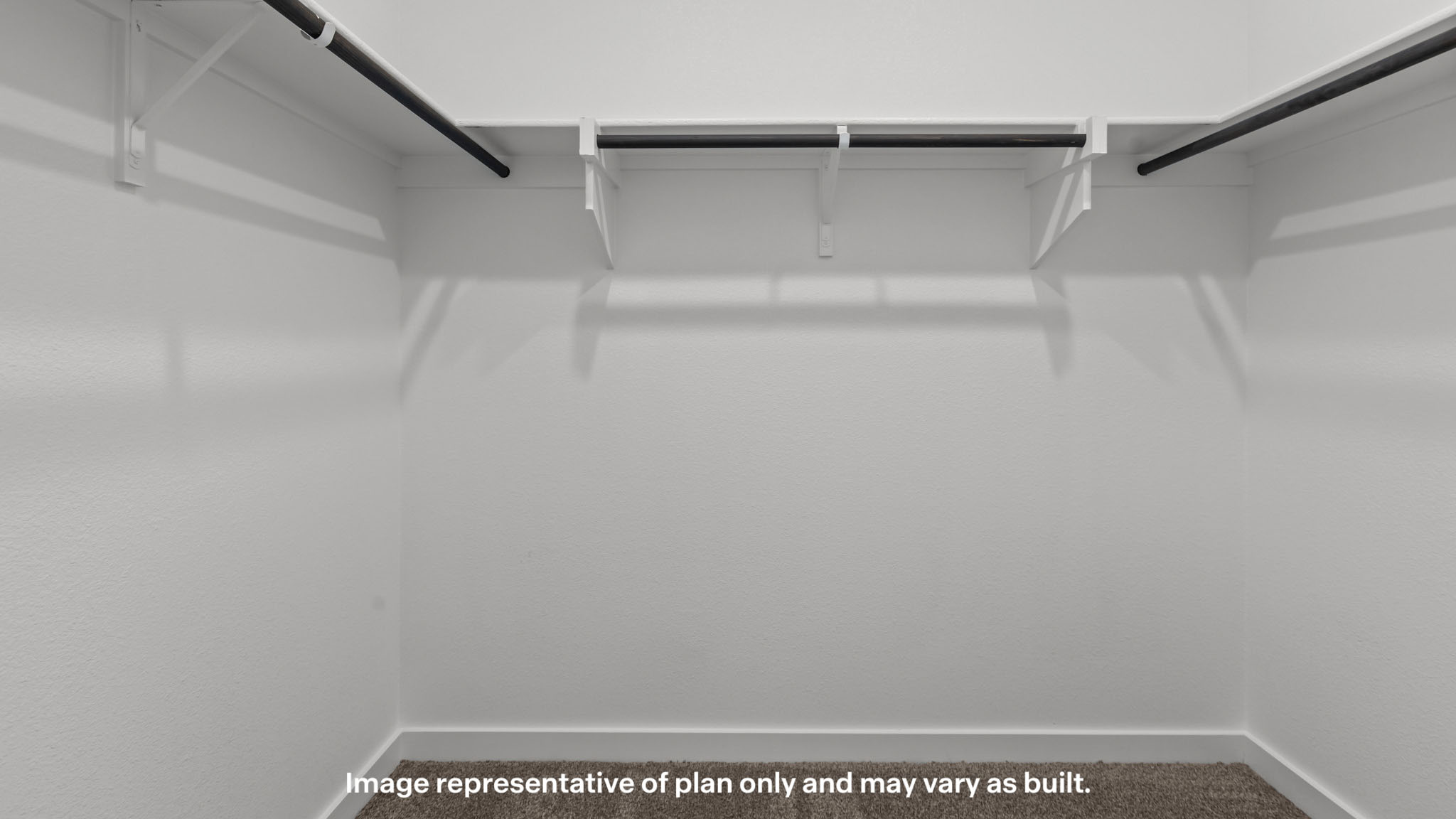 Primary walk-in closet with extra storage space