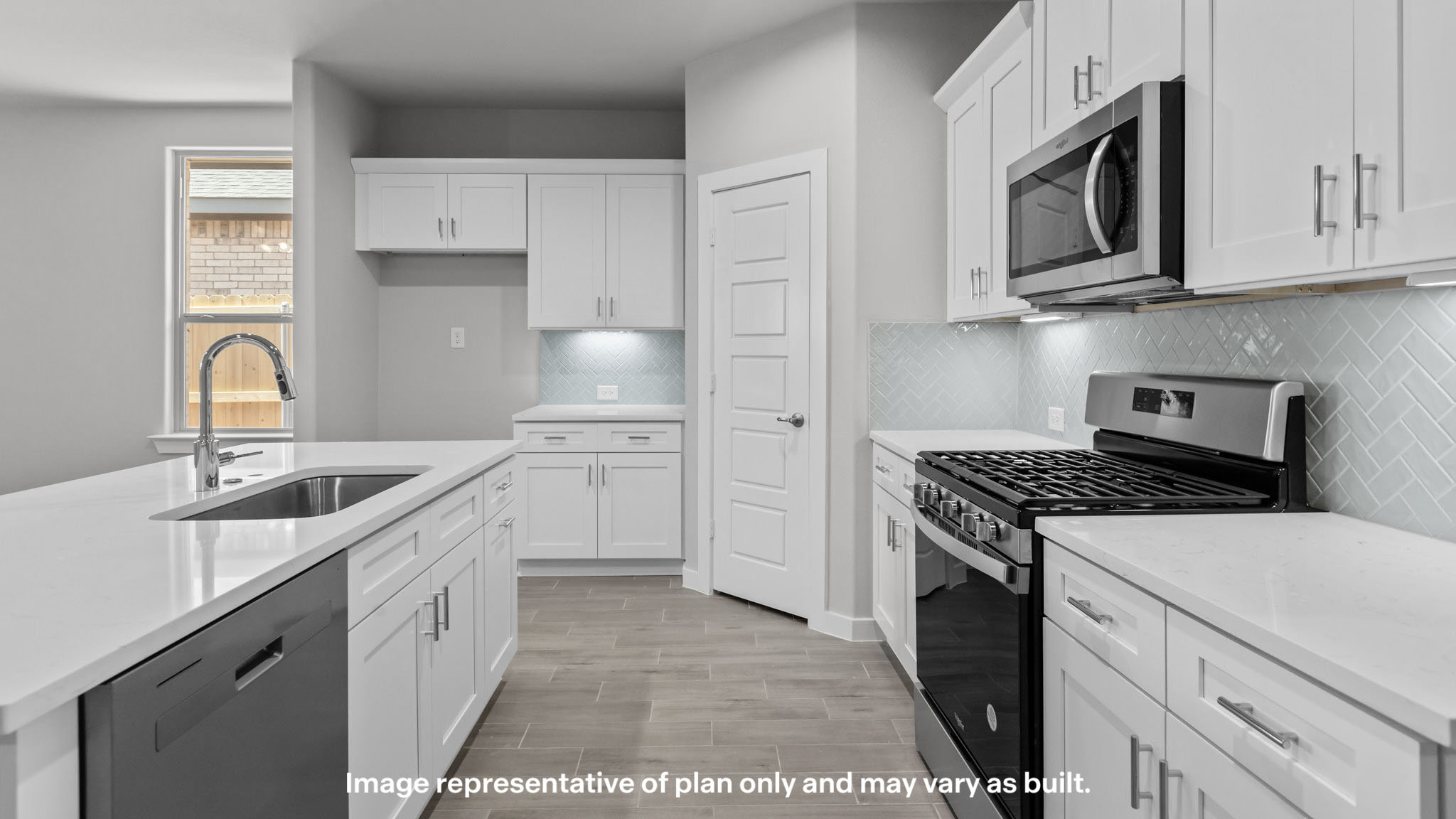 Spacious open concept kitchen with island and counter prep space