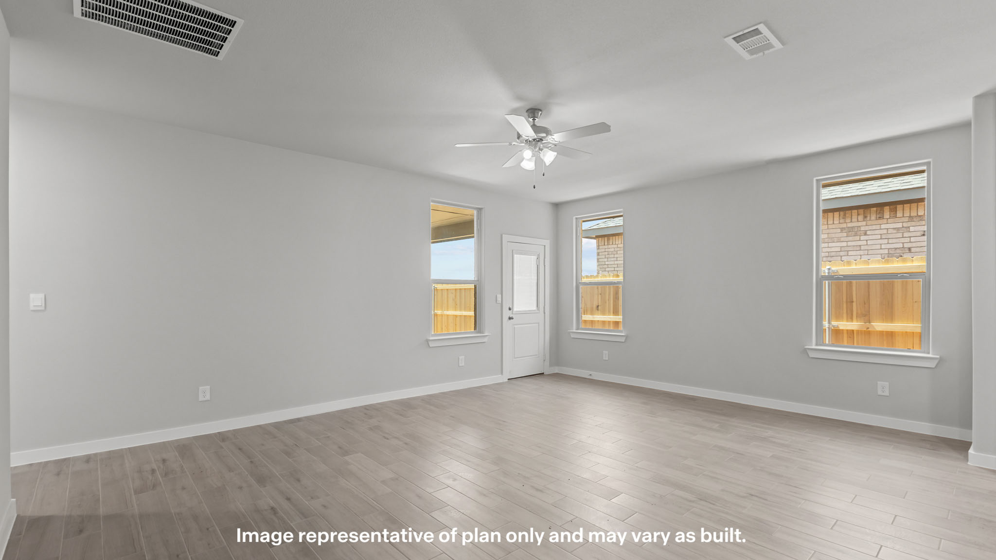 Open living and family room area with ample natural light