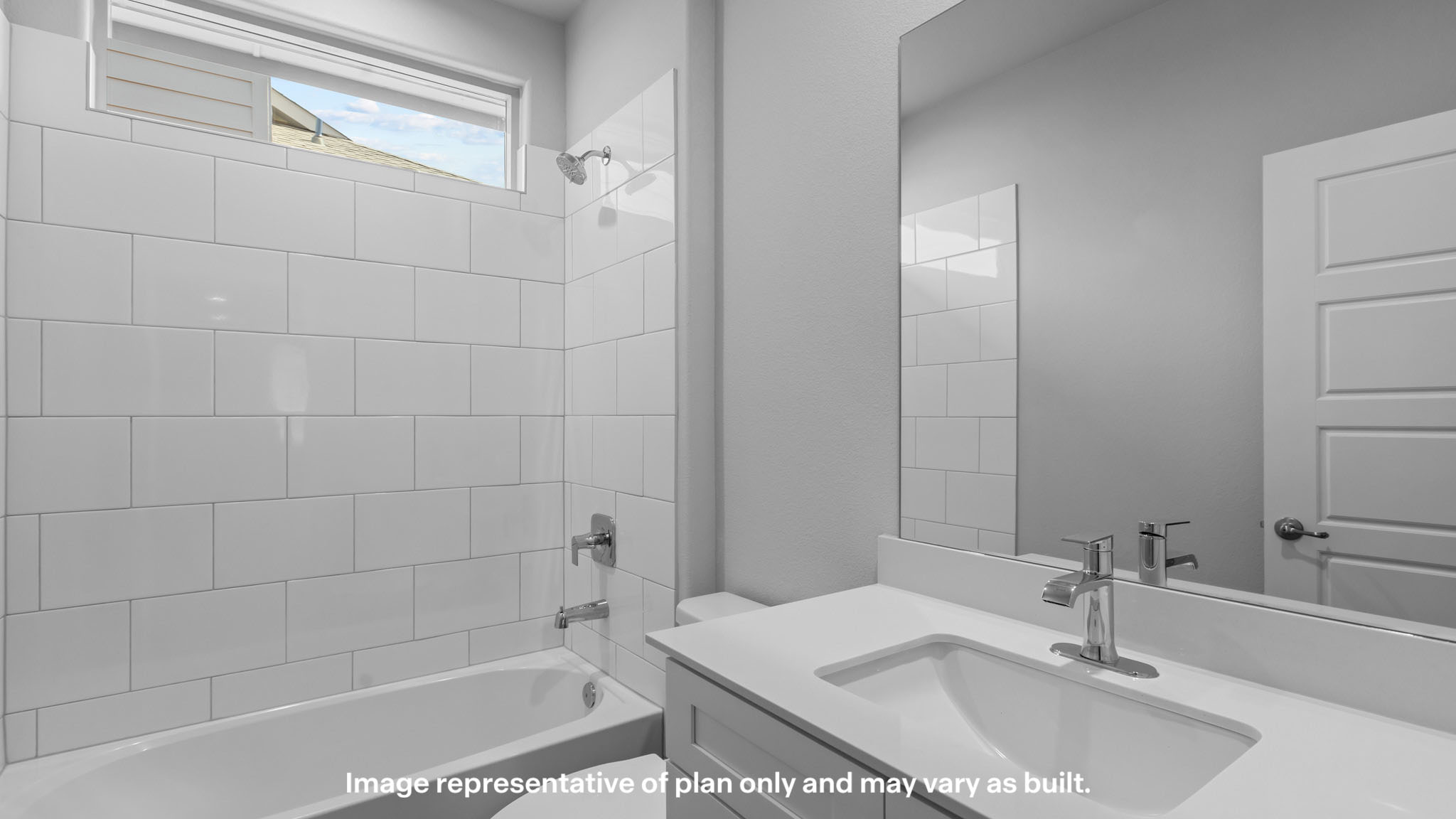 Guest bathroom with built in vanity and combination bathtub shower