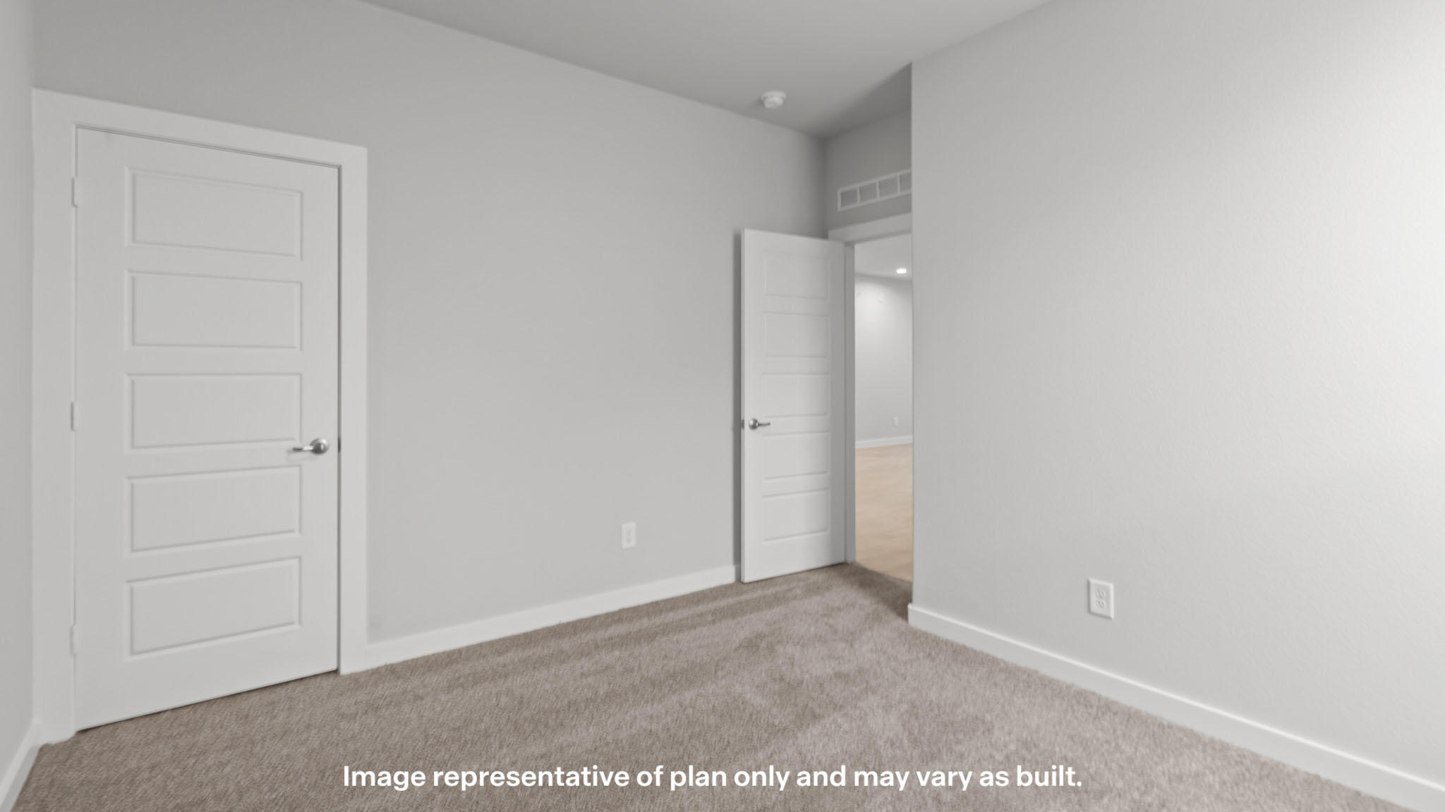 Guest bedroom 3 with plush carpet floors and spacious closet