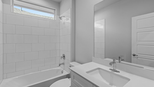 Guest bathroom area with marble vanity tops