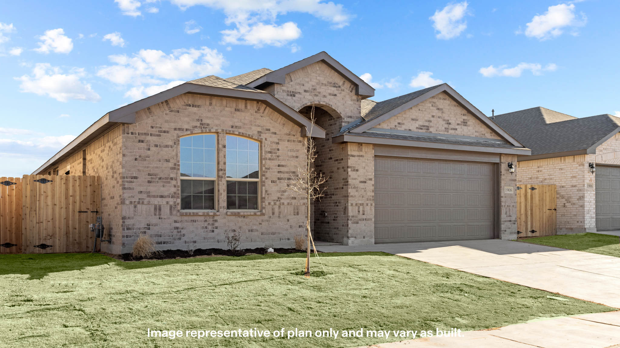 Single story classic brick home with front entry