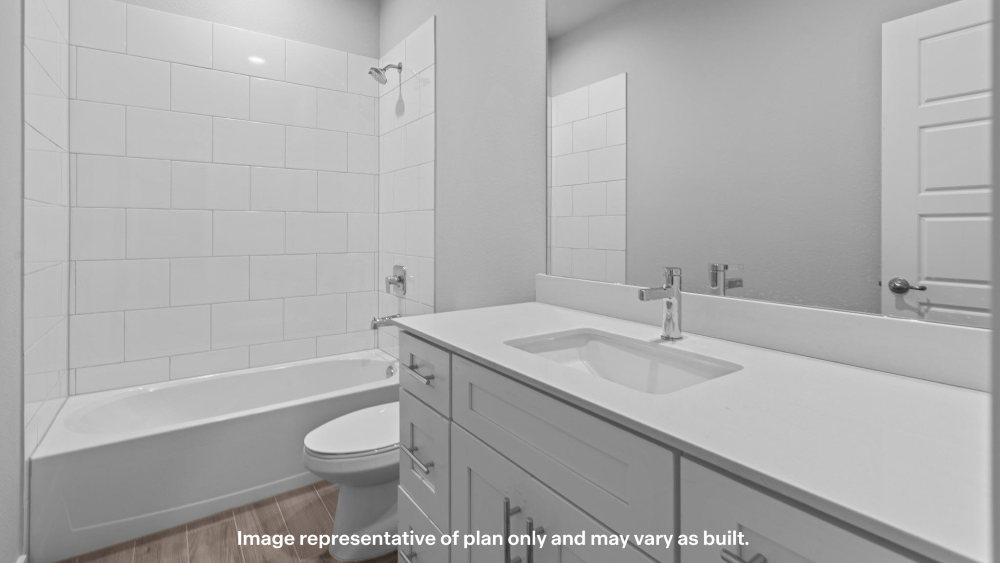 Guest bathroom with built in vanity and combination bathtub shower