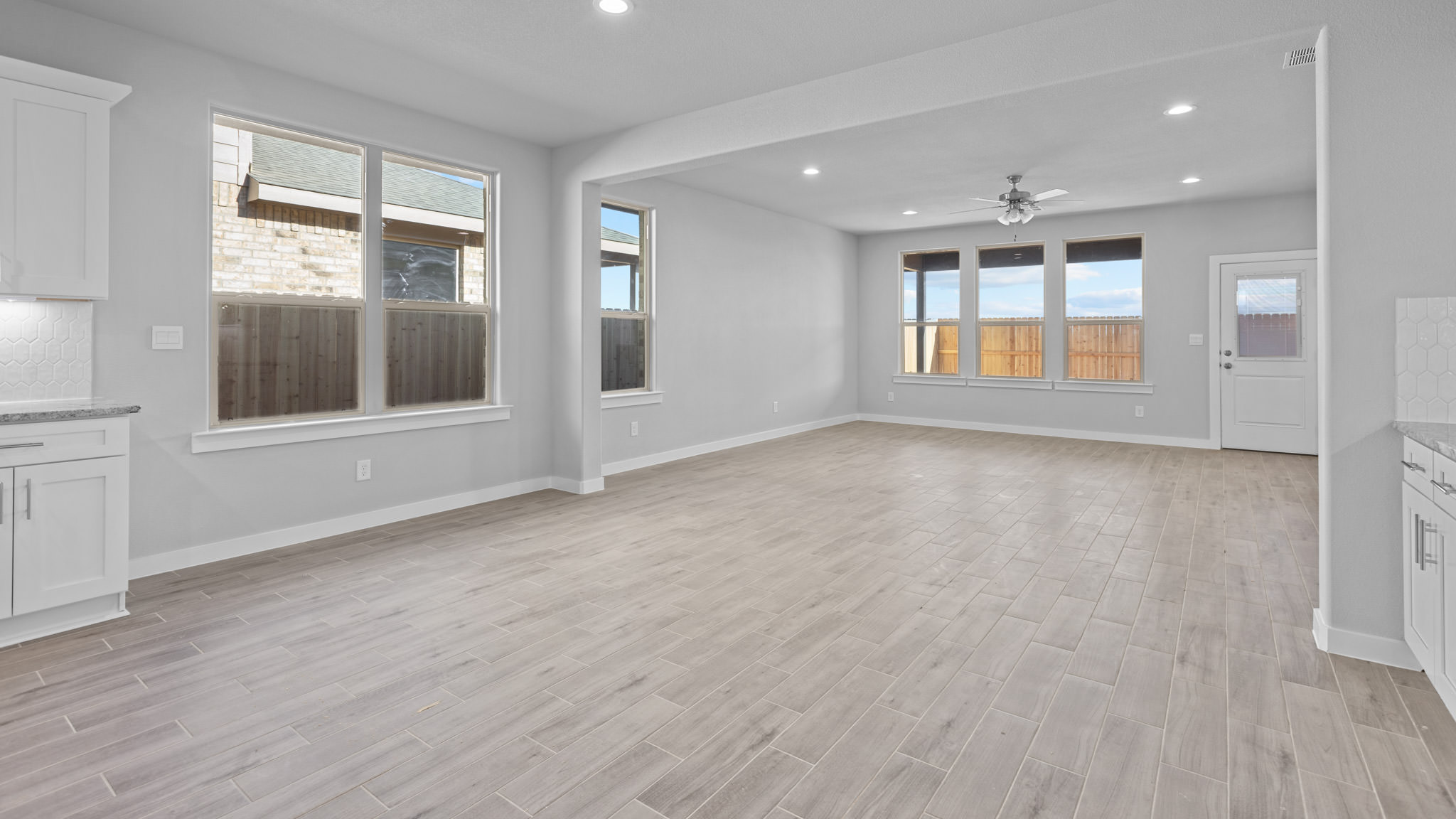 Open concept kitchen, living, family, and dining room space
