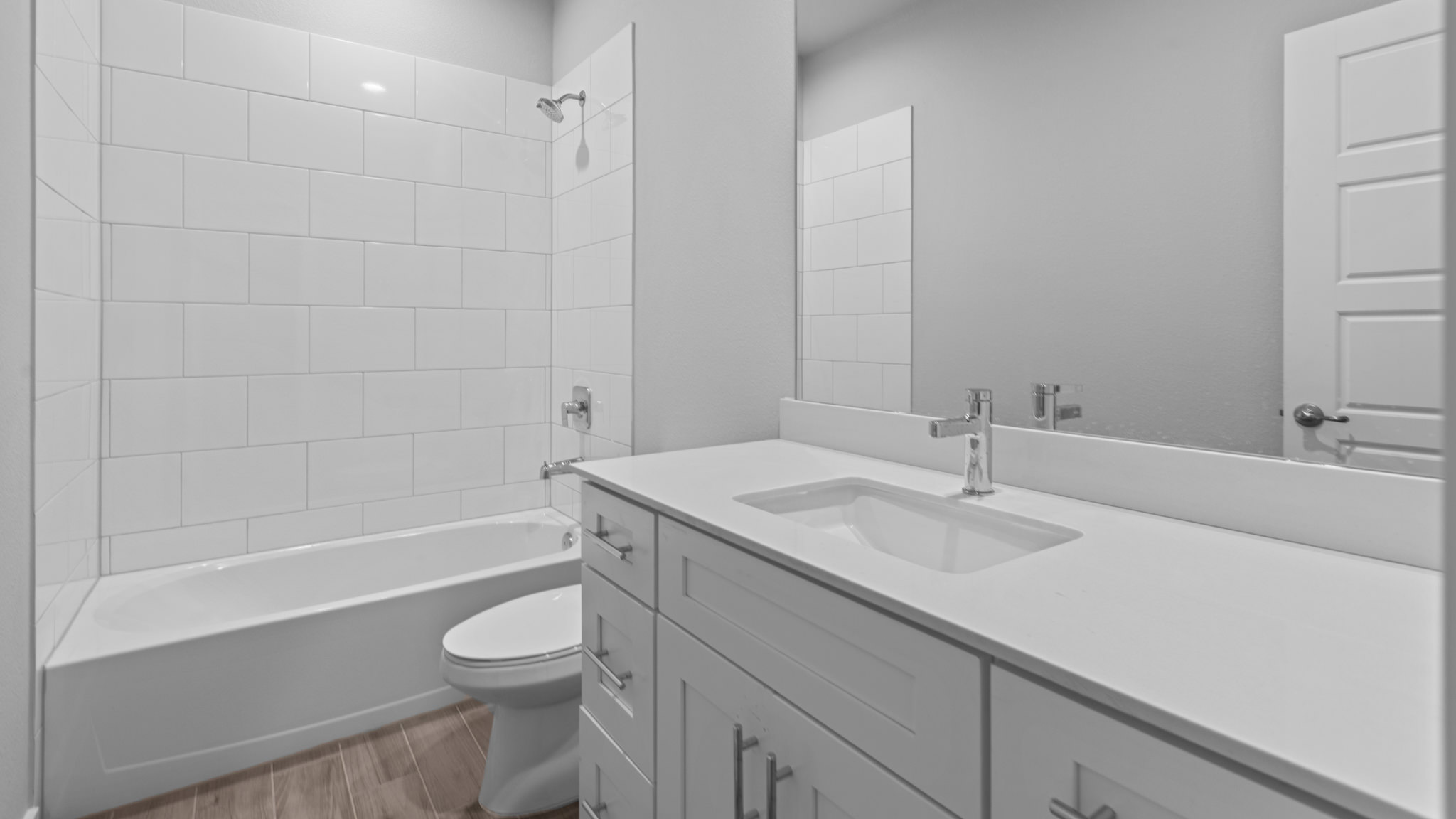 Guest bathroom located between guest bedrooms