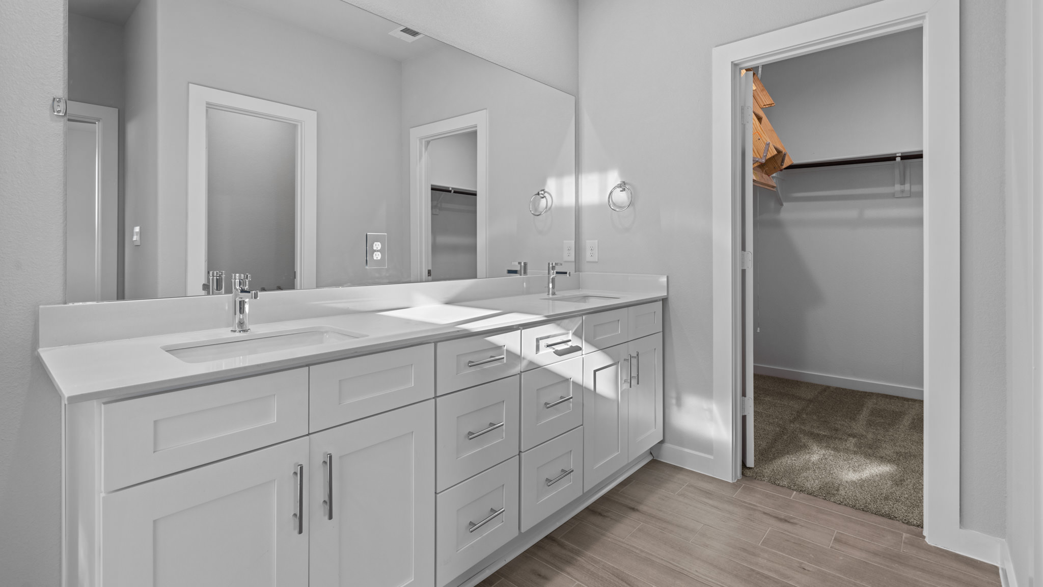 Primary bathroom with luxurious shower and built in storage