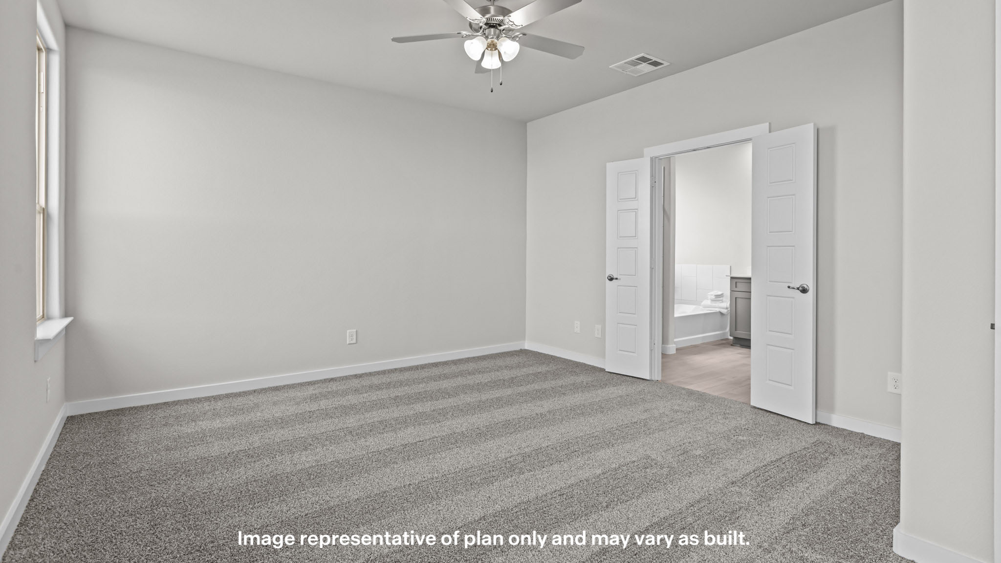 Primary bedroom with plush carpet floors and light allowing double windows