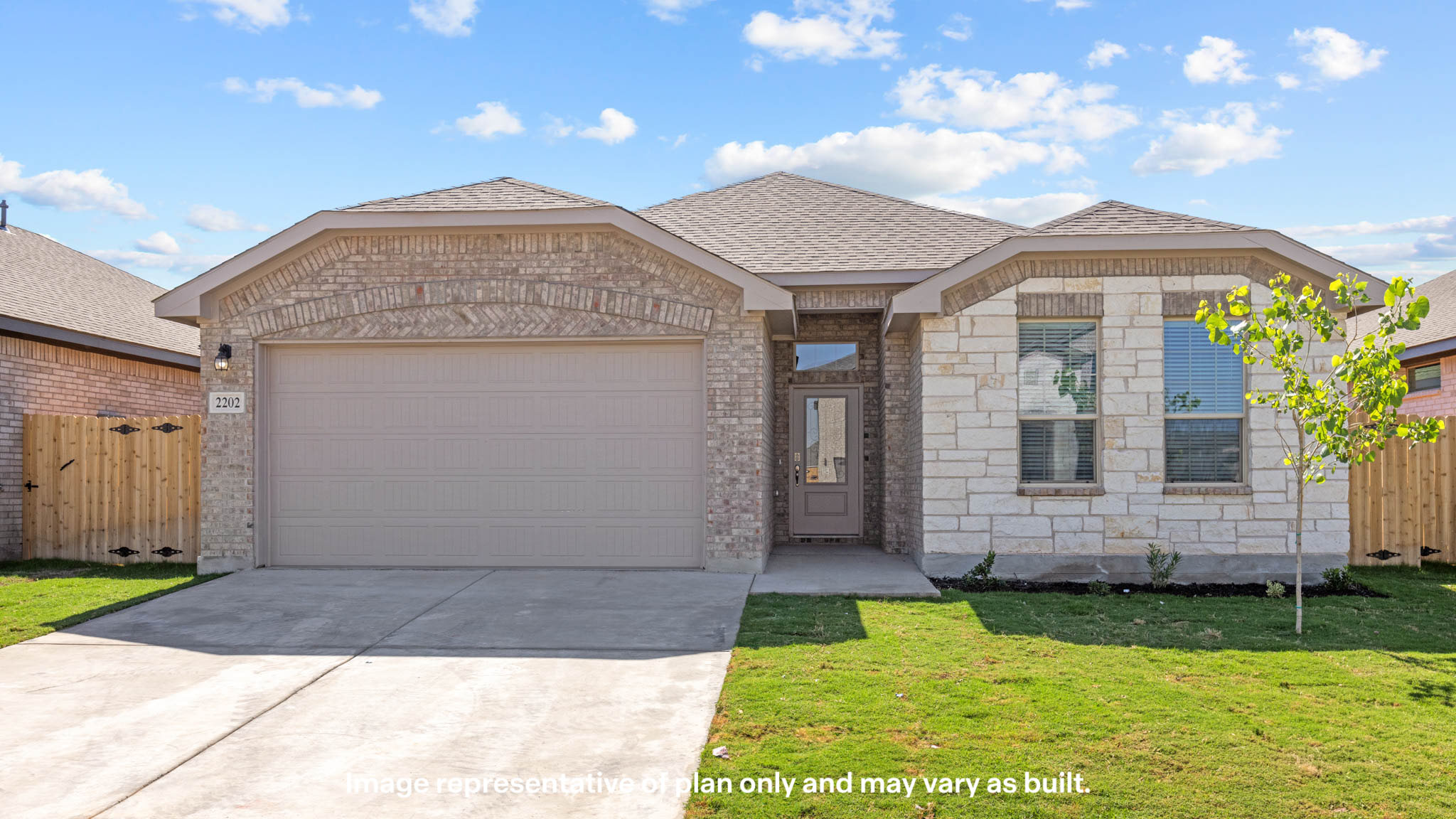 Exterior of single story modern brick style home