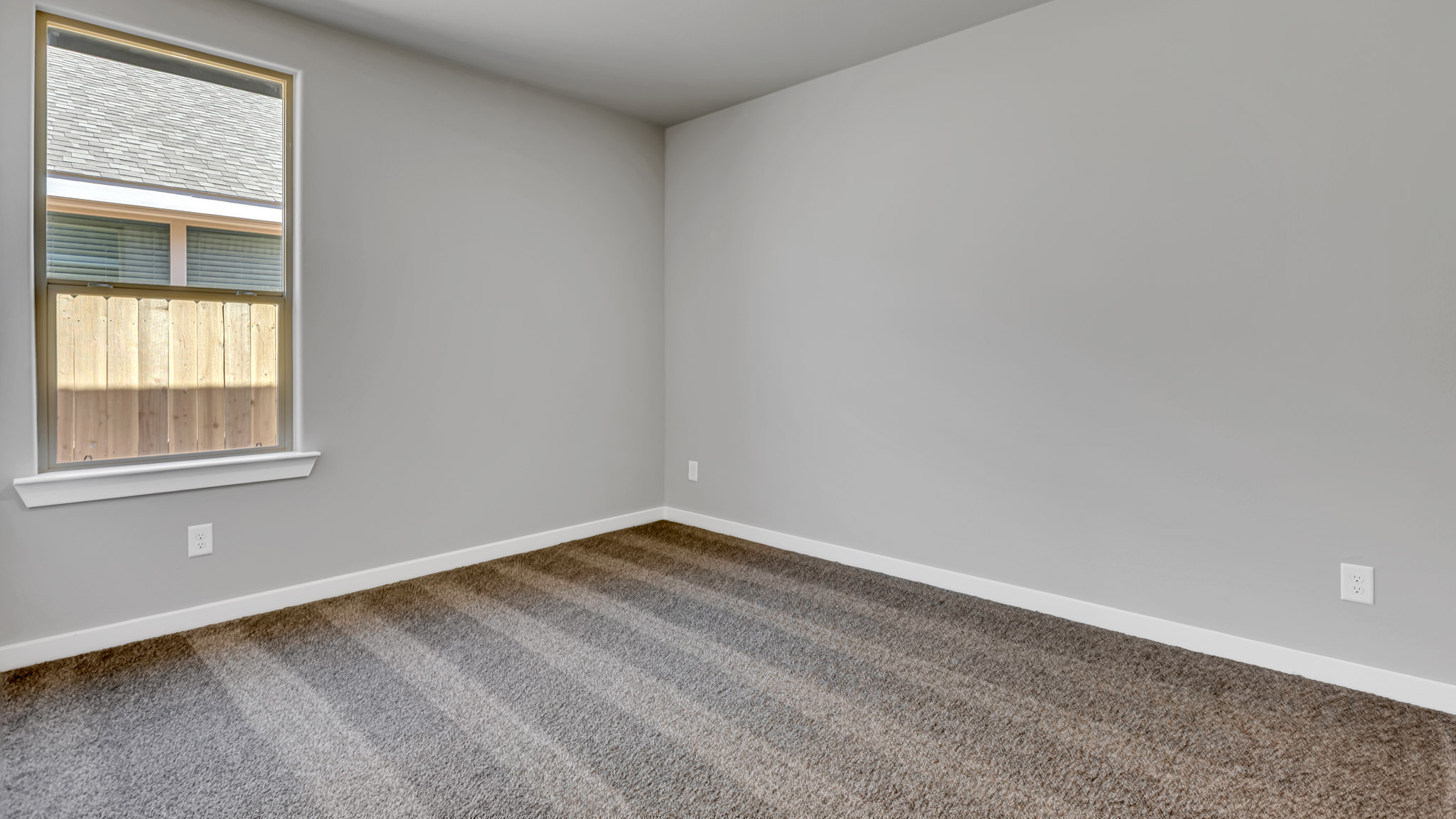 Guest bedroom 3 with plush carpet floors and spacious closet